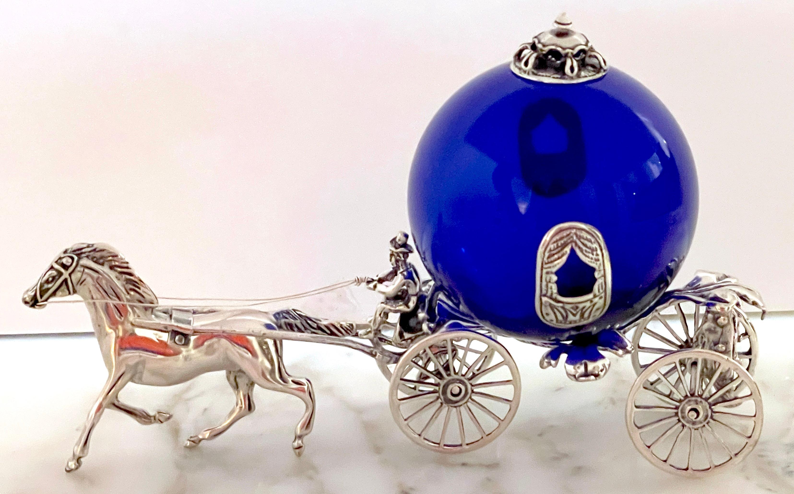 Italian Sterling and Cobalt Murano Glass Fantasy Model of a Horse & Carriage 
Italy, late 20th century 

A captivating Italian Sterling and Cobalt Murano Glass Fantasy Model of a Horse & Carriage, from the later 20th century, This remarkable piece