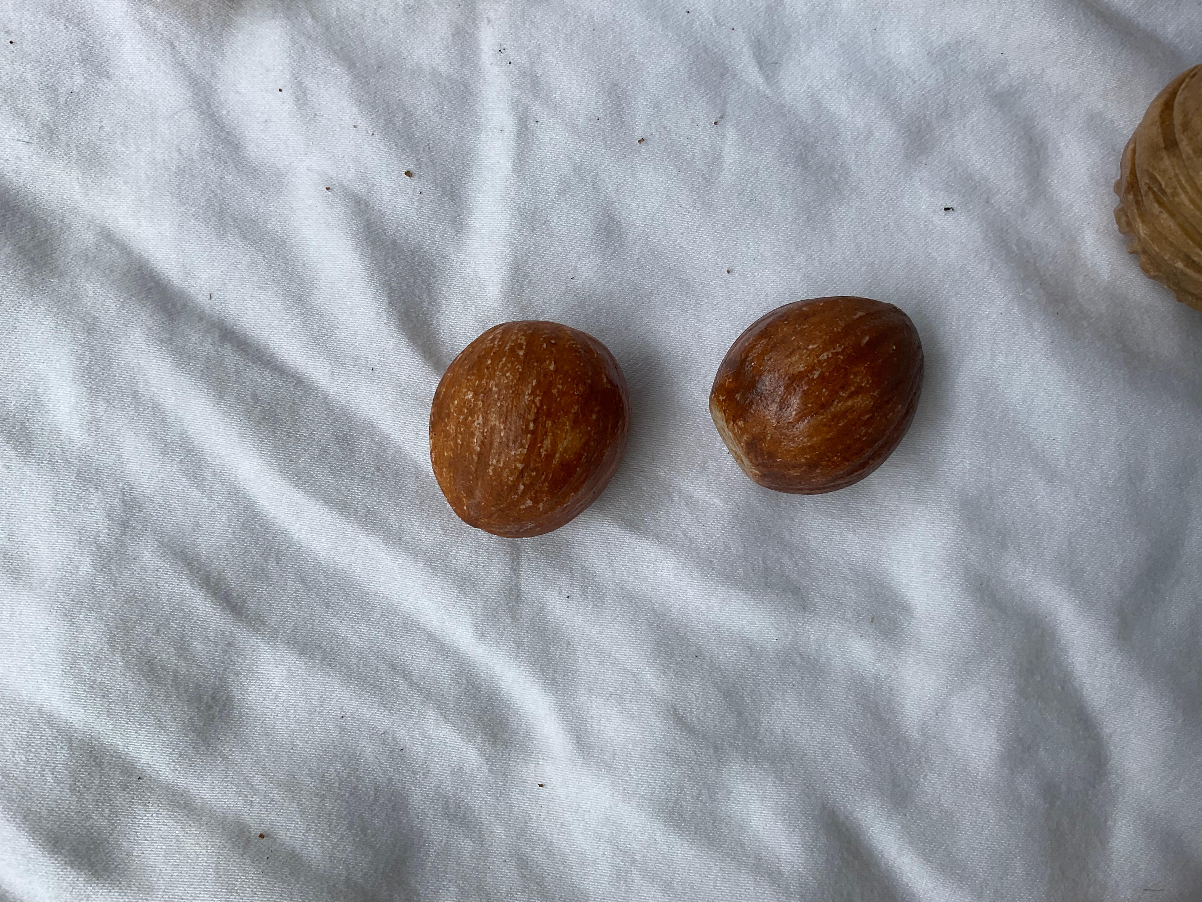 This listing is for 13 Italian stone nuts. There are 2 almonds, 2 hazelnuts, and the rest walnuts. The pieces have been bought at different times, in different places. There is a difference in appearance, in some of the walnuts. They were
