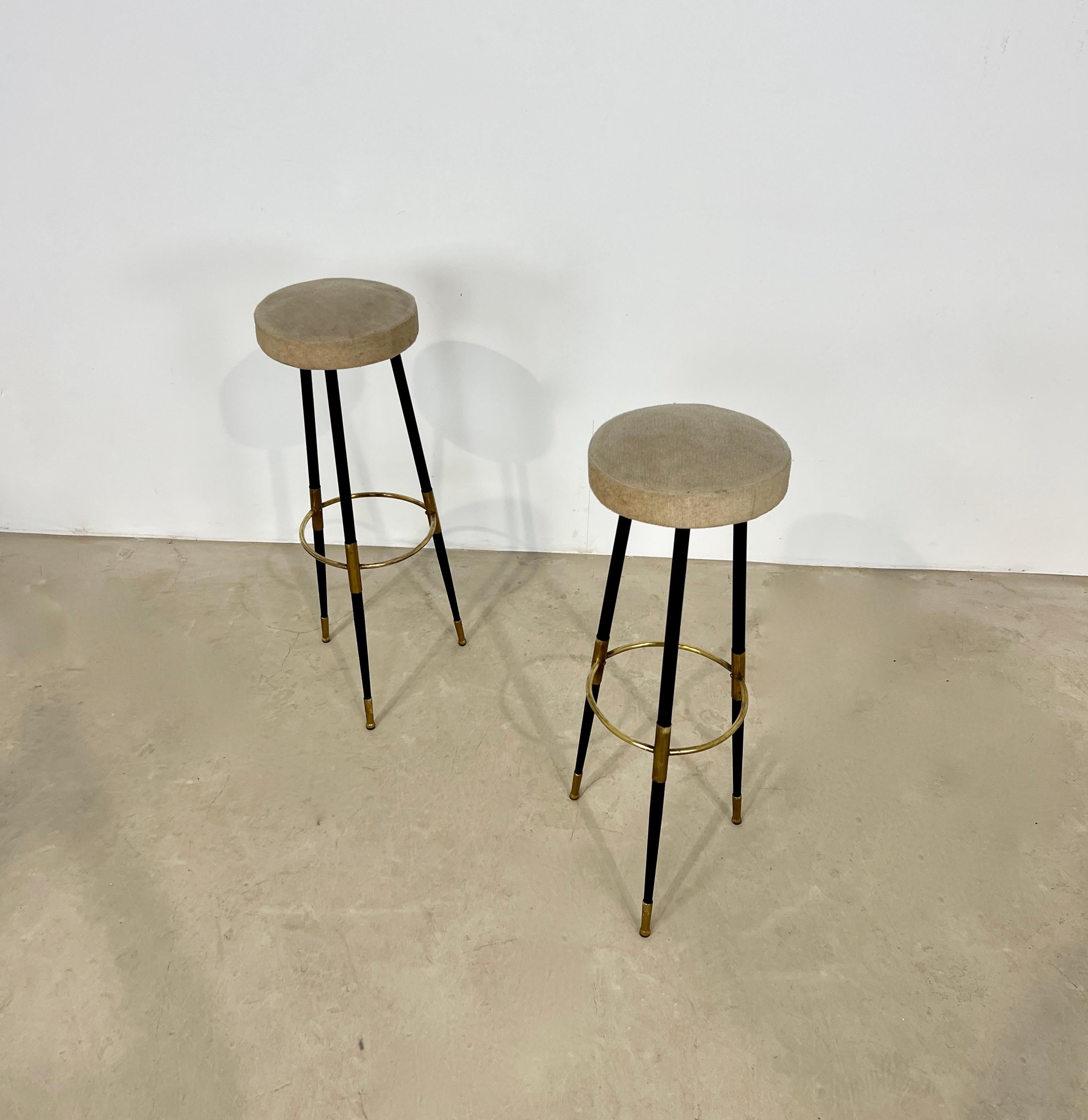 Pair of Italian stools in metal, brass and fabric. Wear due to time and age of the stools.