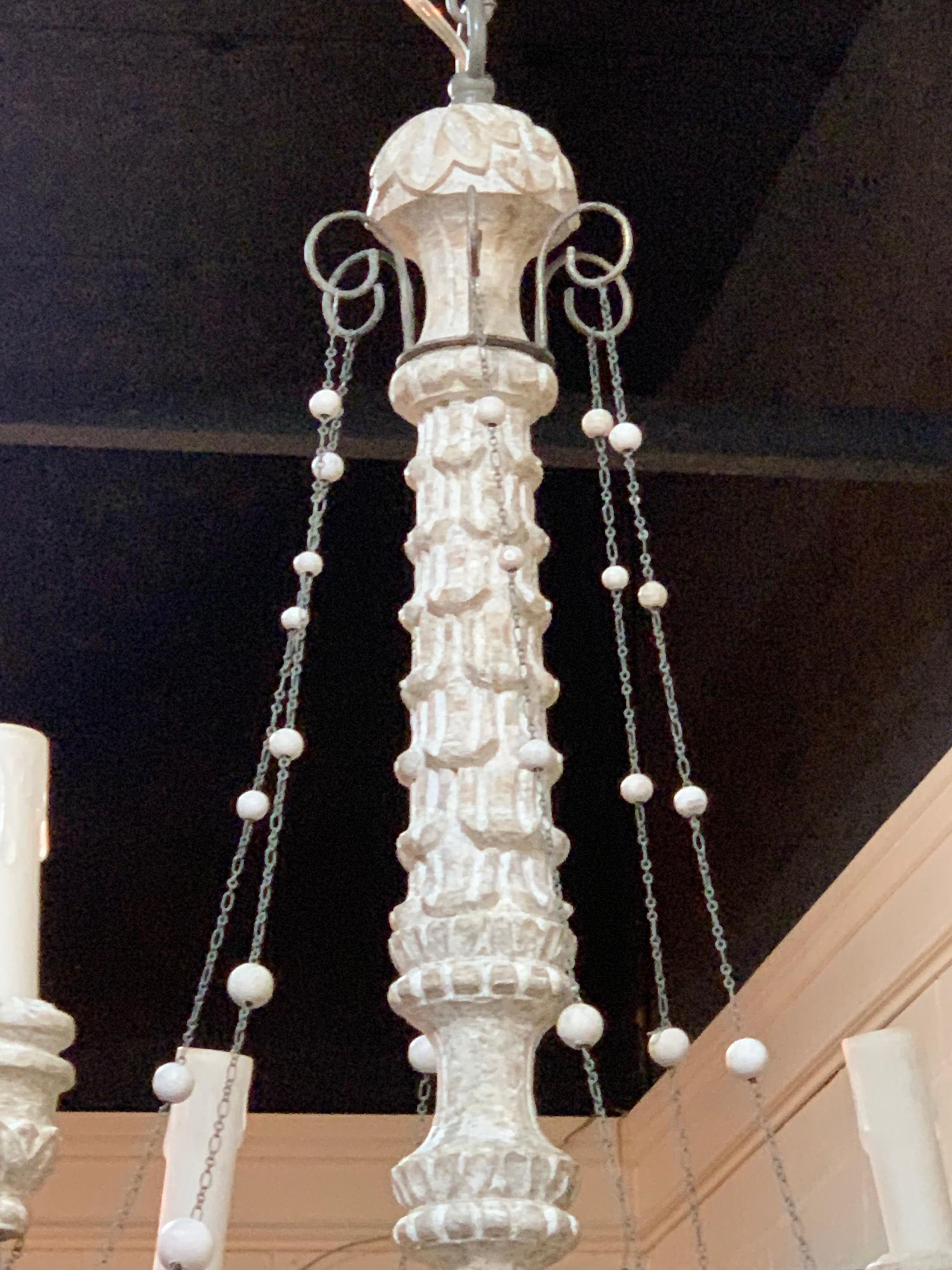Lovely Italian style carved and painted chandelier with 6 lights. Very nice carvings and patina on this fixture. Would mix well with a variety of decors.