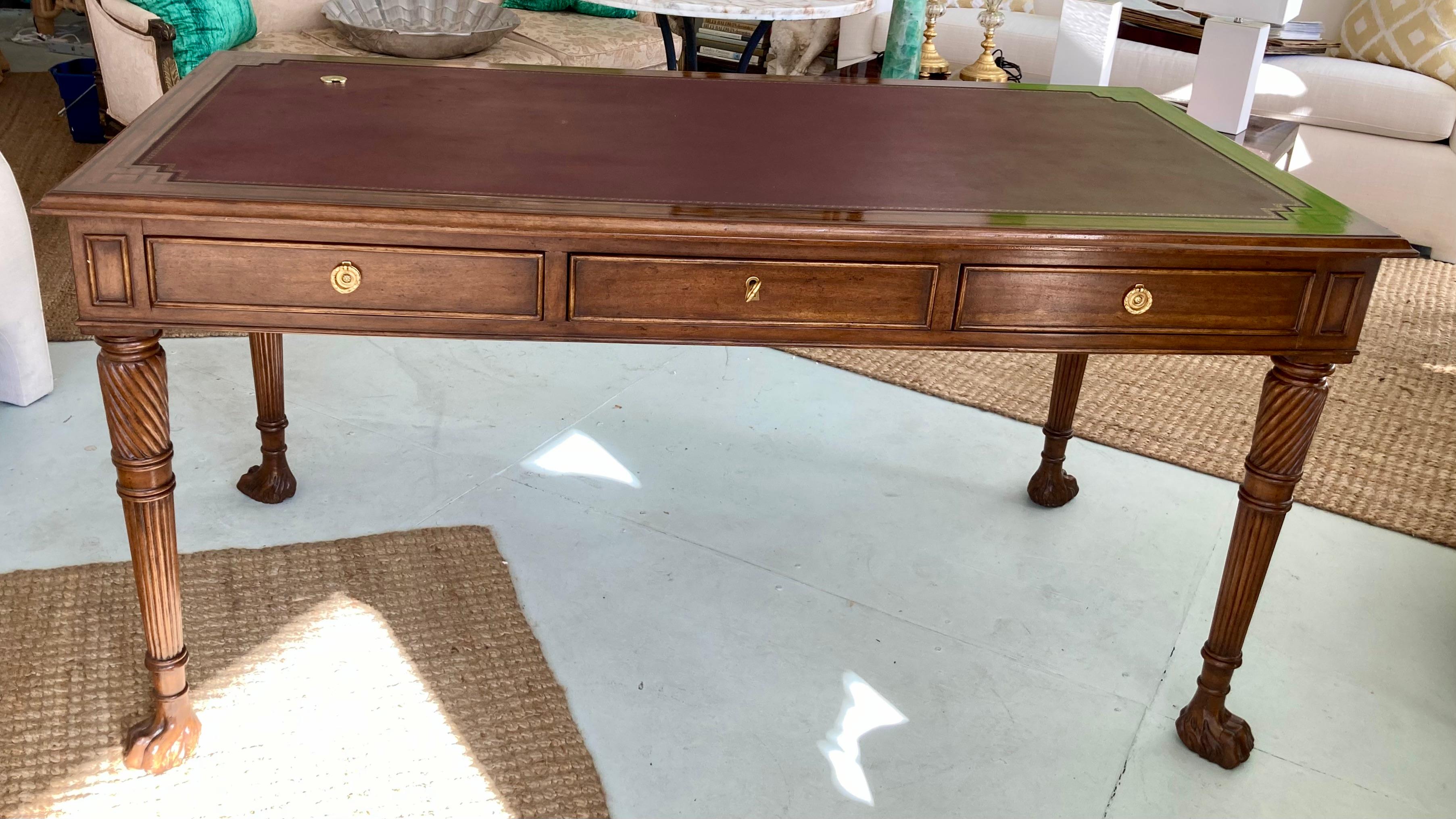 Italian style writing desk with red leather top. Each drawer is lined with leather. Amazing quality hand carving details, finish, craftsmanship, and hardware. Add some Italian style to your interiors.