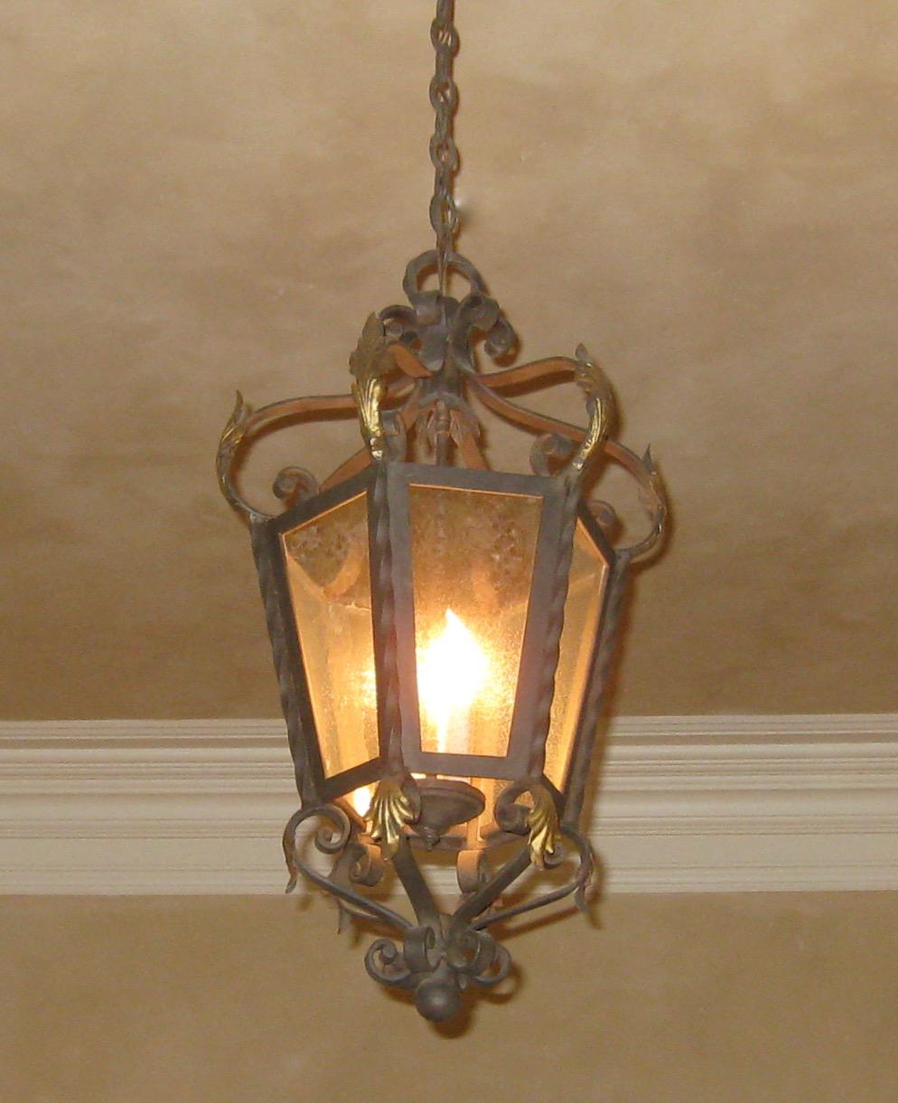 Part of the Chandelier product line, this is our Italian Lantern B. This fixture can be used for interior or exterior use and is UL listed. 3' chain included. Three candelabra base bulbs up to 60 watts/socket. Also available in a lighter iron gauge