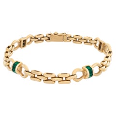 Italian style link bracelet in 18k yellow gold with emeralds