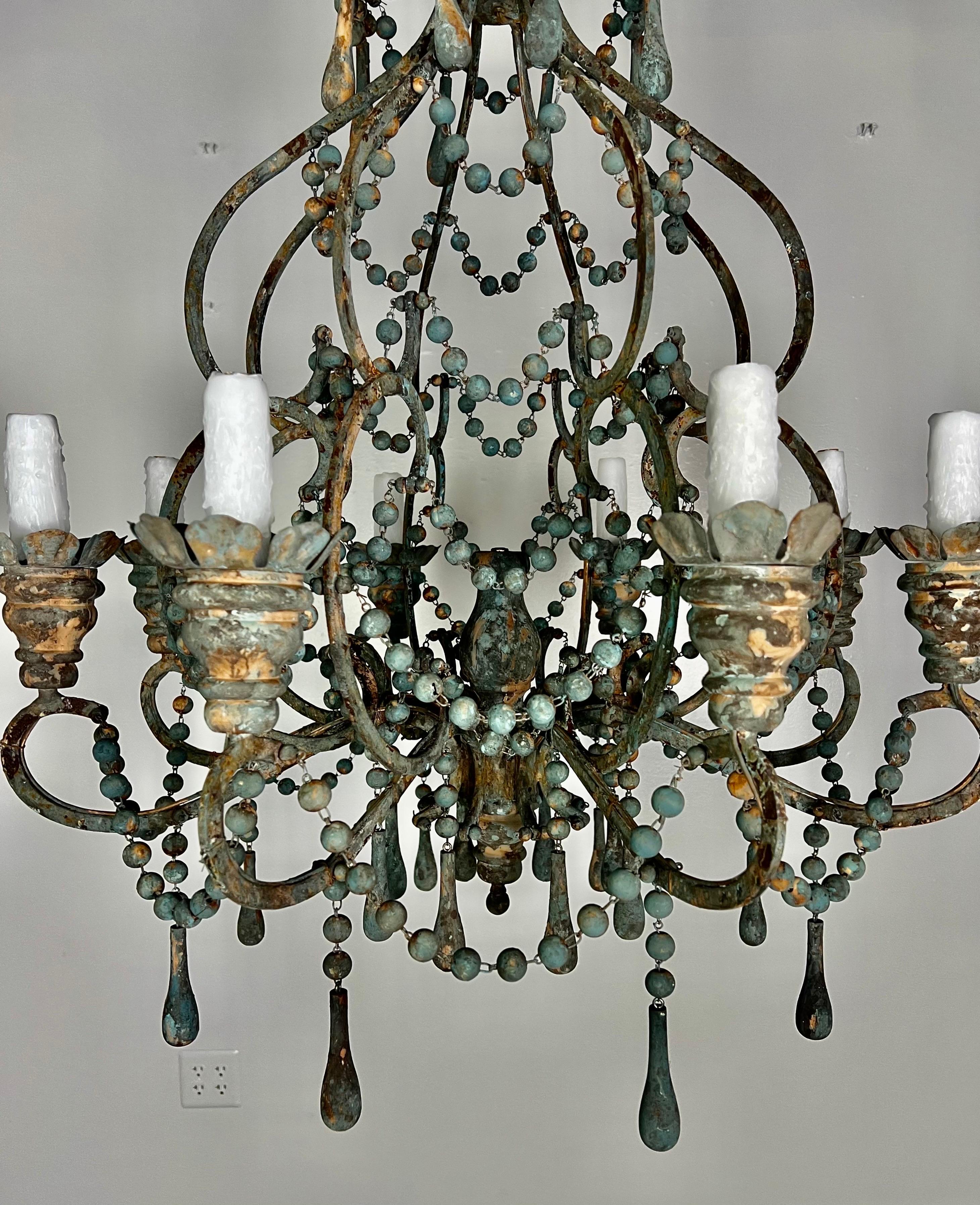 Rococo Italian Style Wood and Iron Chandelier with Wood Drops For Sale