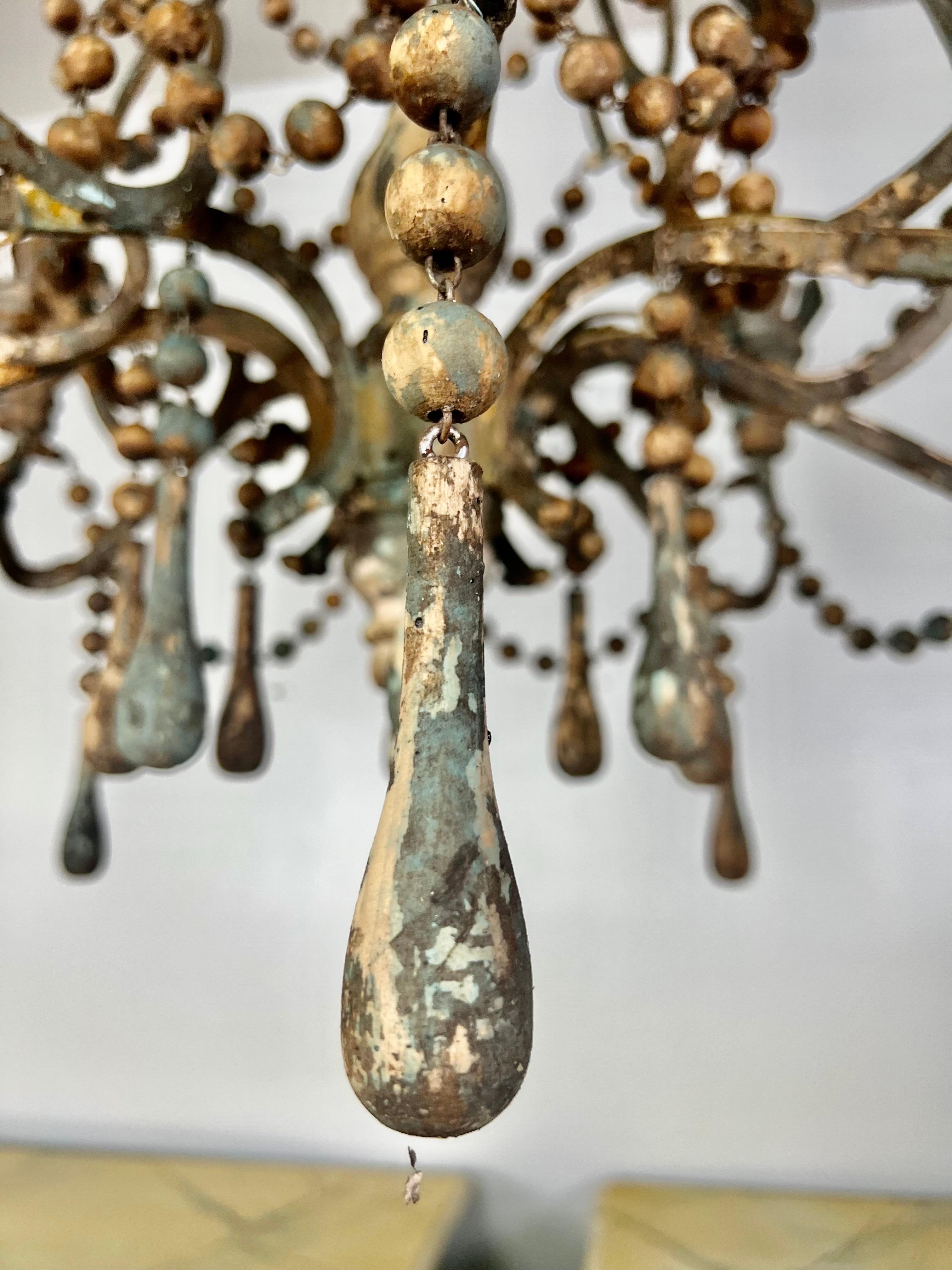 Amalfi Wood and Iron Chandelier with Wood Drops By Miamar Home For Sale 6