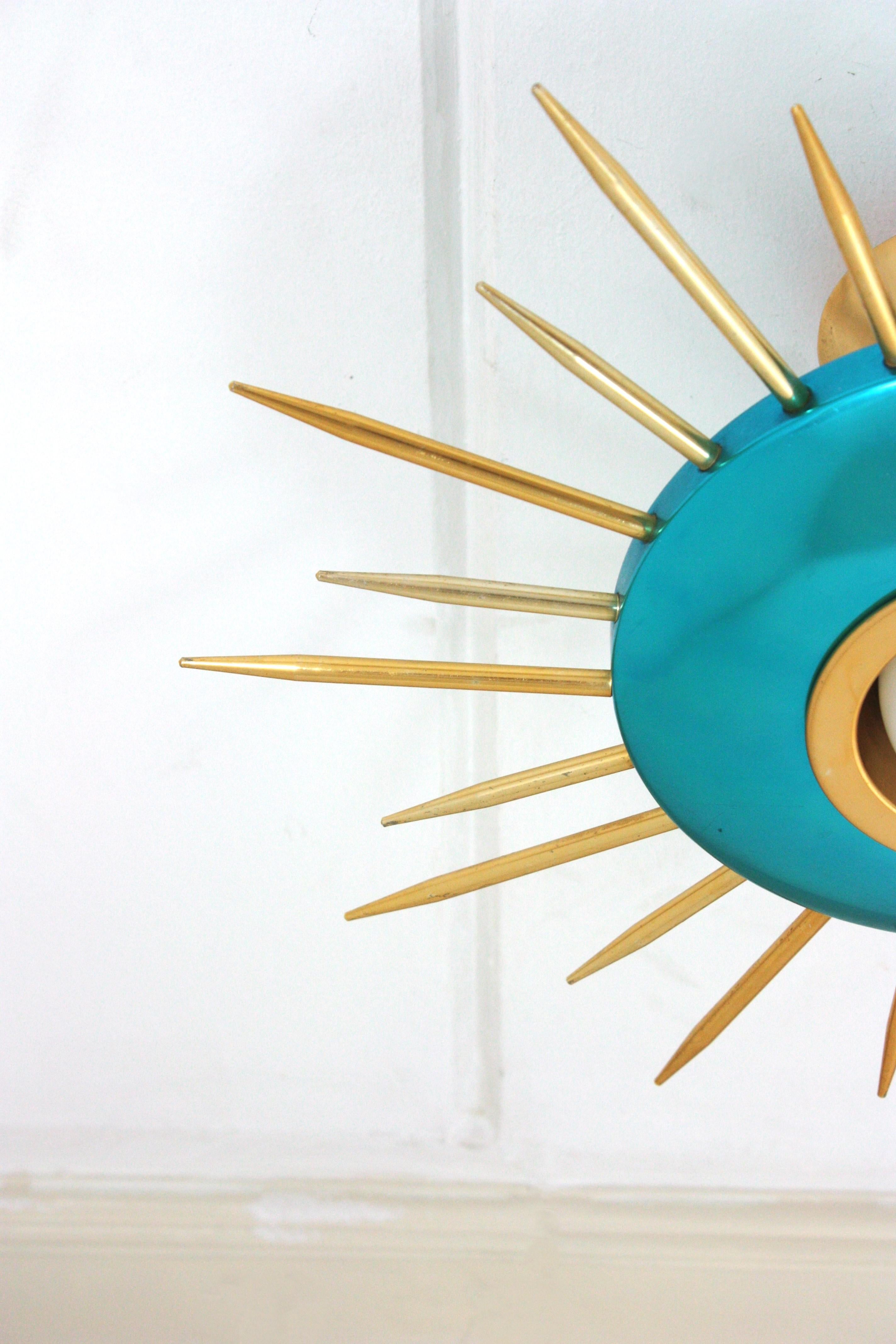 Lámpara de techo italiana Sunburst en metal azul y dorado, años 50 Metal en venta
