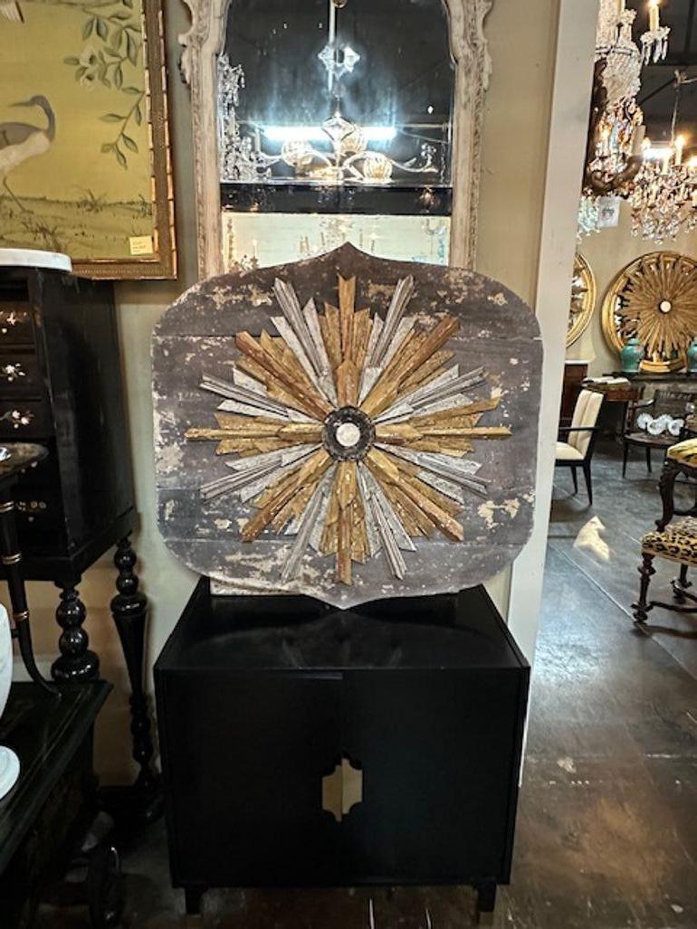 Decorative Italian carved and painted sunburst mirror panel. Sure to make a statement!