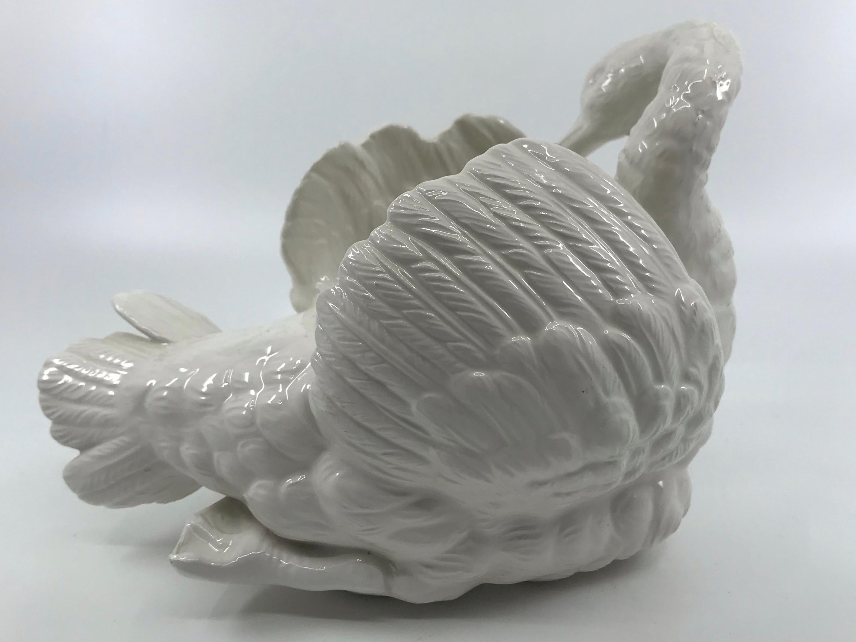Italian swan cachepot sculpture. Lovely ceramic swan in the form of a small planter cachepot, beautifully rendered with stamp marks for Este. Italy, mid 20th century
Dimensions: 6.25” H x 8.75