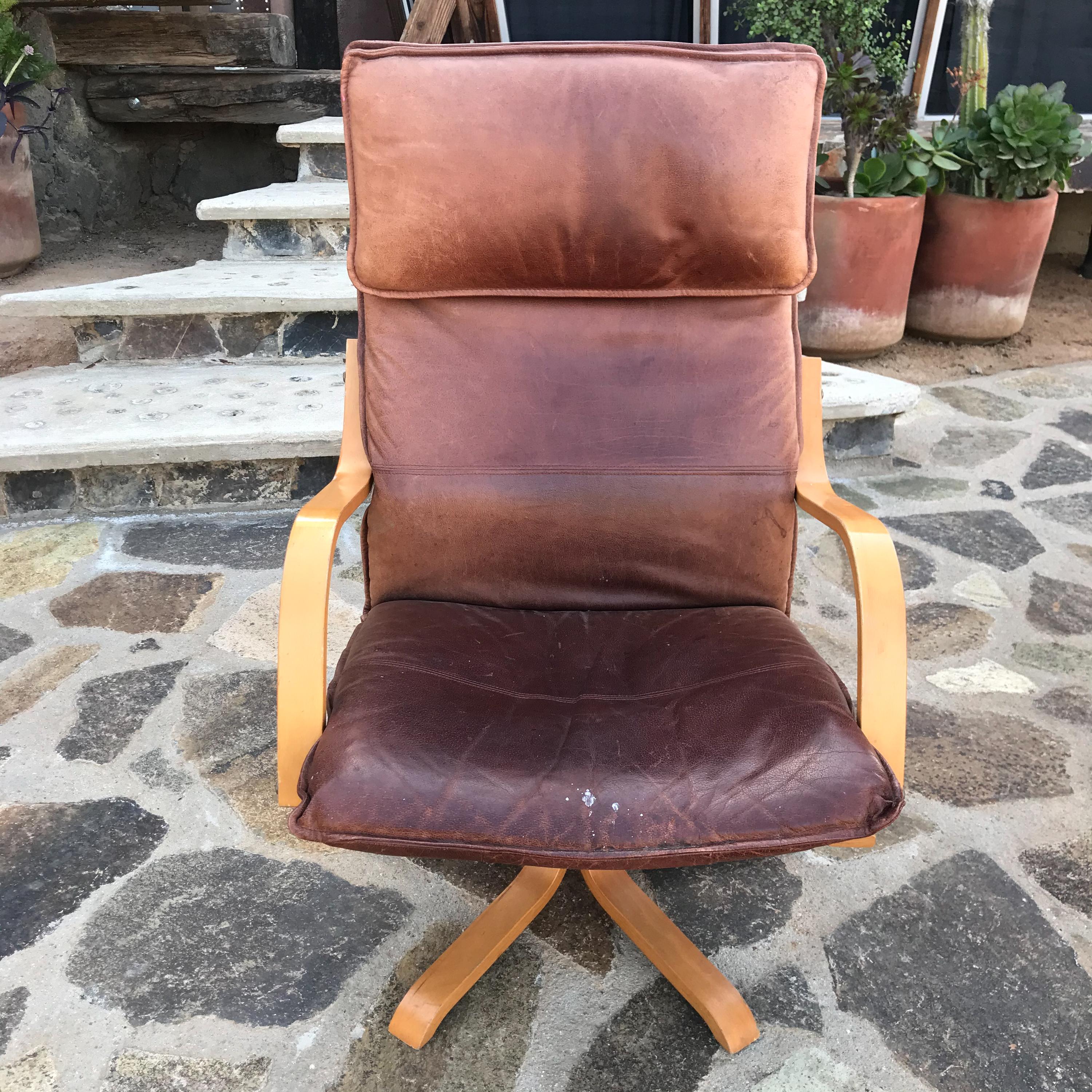 1960s Scandinavian style Italian Swiss design made in Italy set of two vintage tall high back leather lounge chairs on a blonde wood star base.
No information on the maker available from Italy
Price is per set of two chairs similar to De Sede and