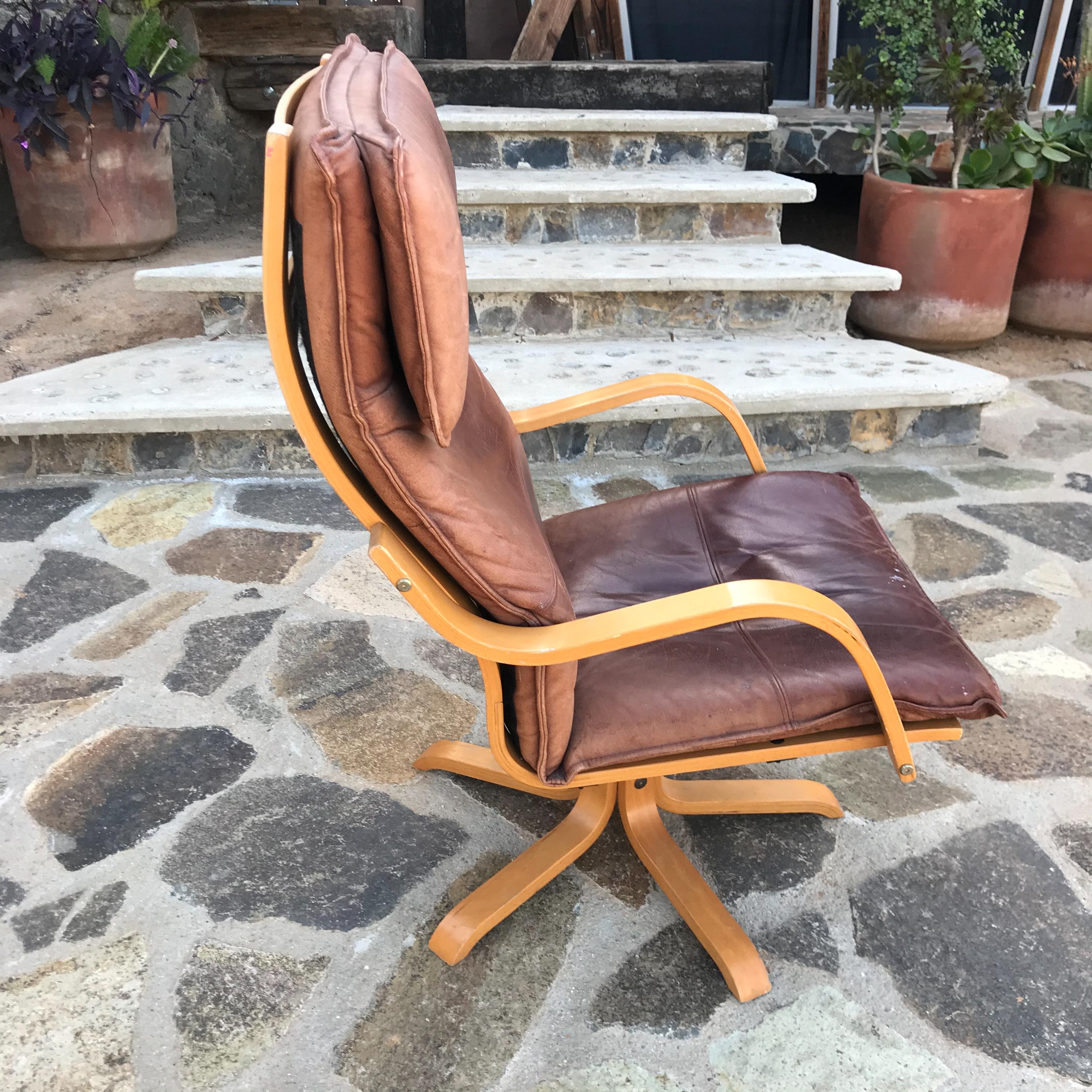 Mid-20th Century Italian Swiss Tall Lounge Chairs Aged Leather Blonde Wood Star Base 1960s Modern