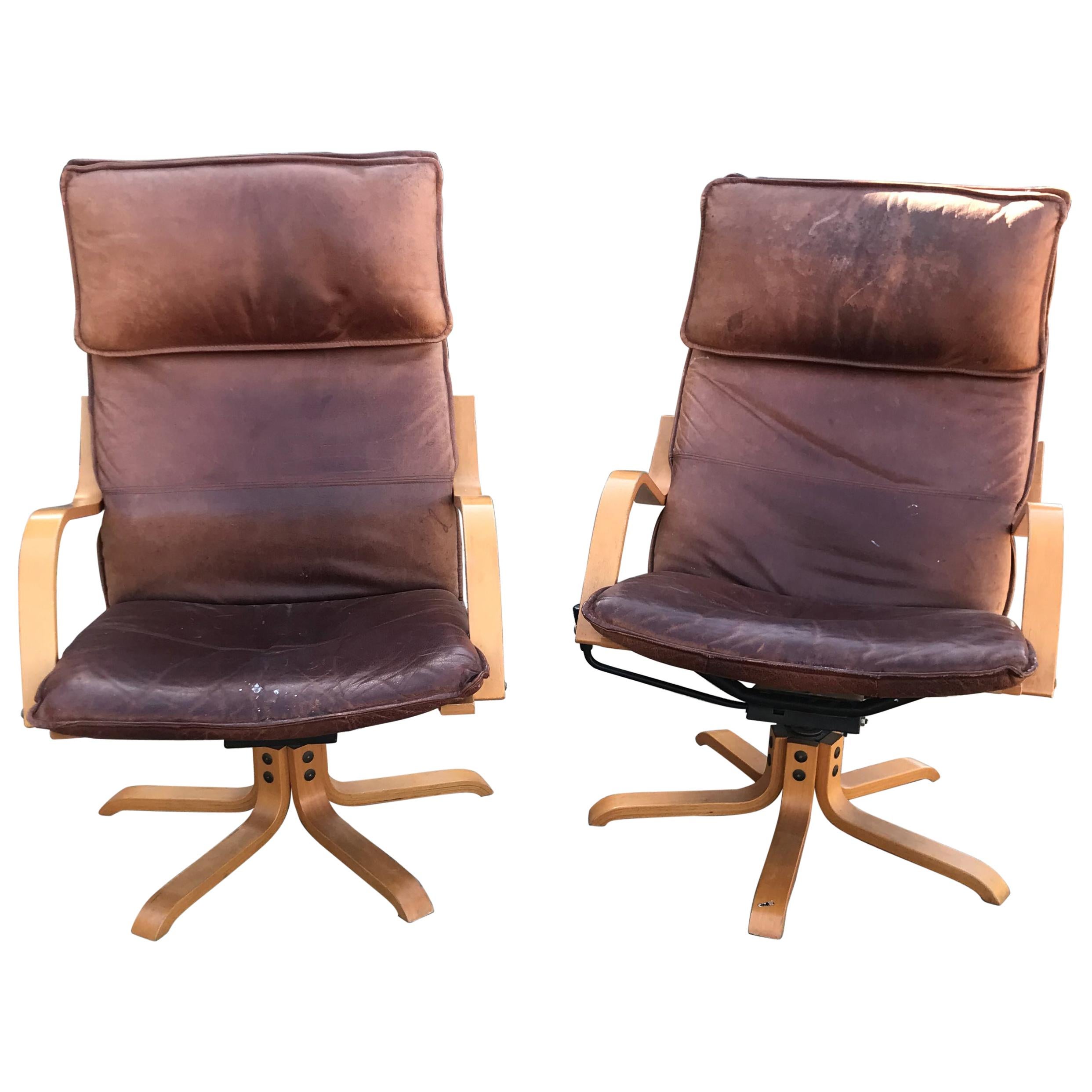 Italian Swiss Tall Lounge Chairs Aged Leather Blonde Wood Star Base 1960s Modern