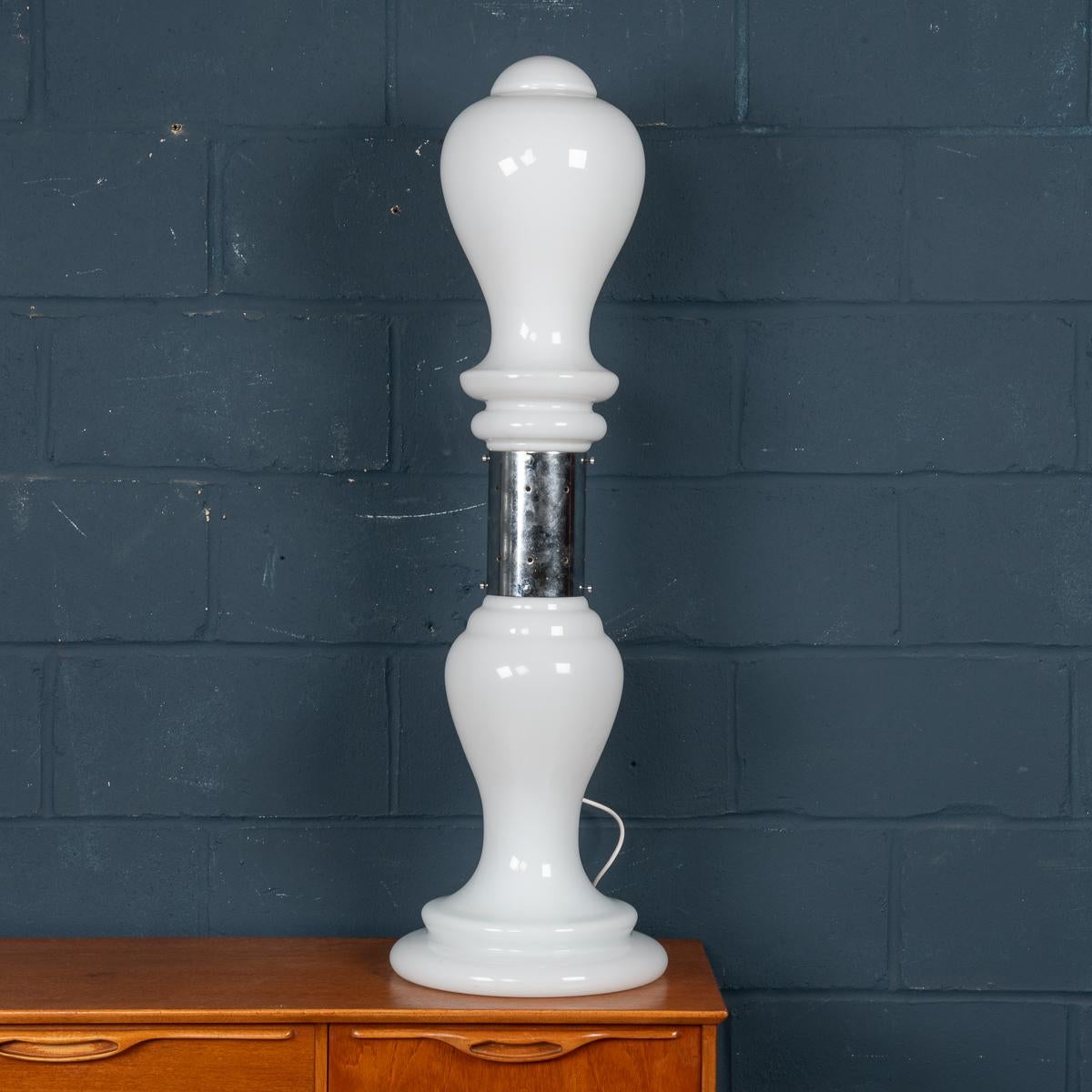A wonderful vintage Italian floor lamp or large table lamp made by Carlo Nason for Mazzega. Produced in Murano, Venice in the 1980s, this glass lamp exemplifies Carlo Nason’s workmanship. Nason has used a lovely shaped white form for the glass base