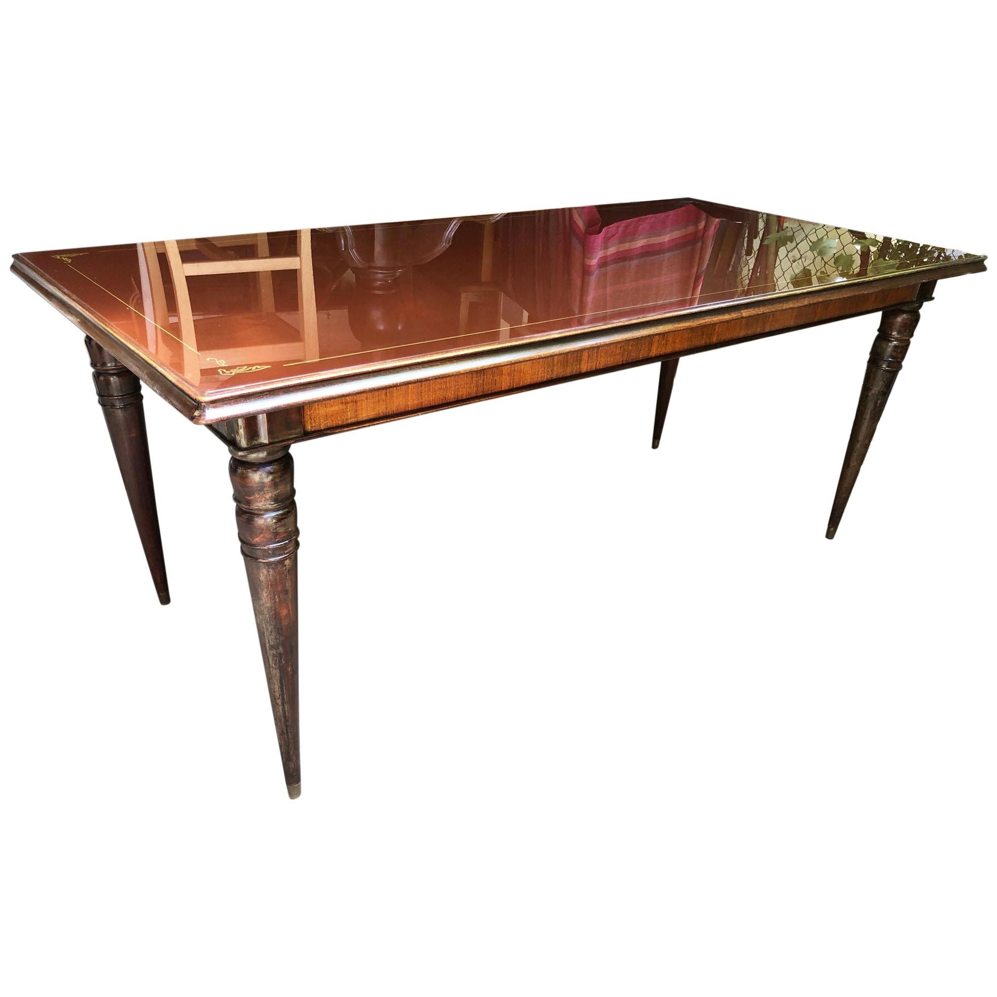 Italian Table from 1960, Original in Walnut, with Turned Leg, Brown Glass Top For Sale