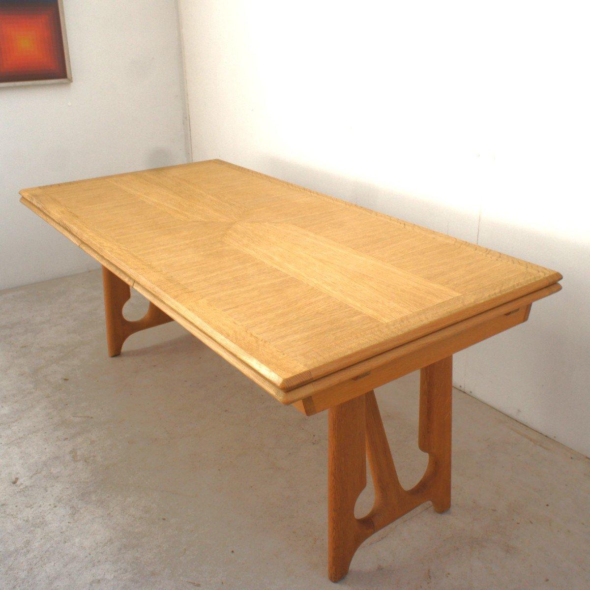 Splendid dining room table in light oak by Guillerme and Chambron for 