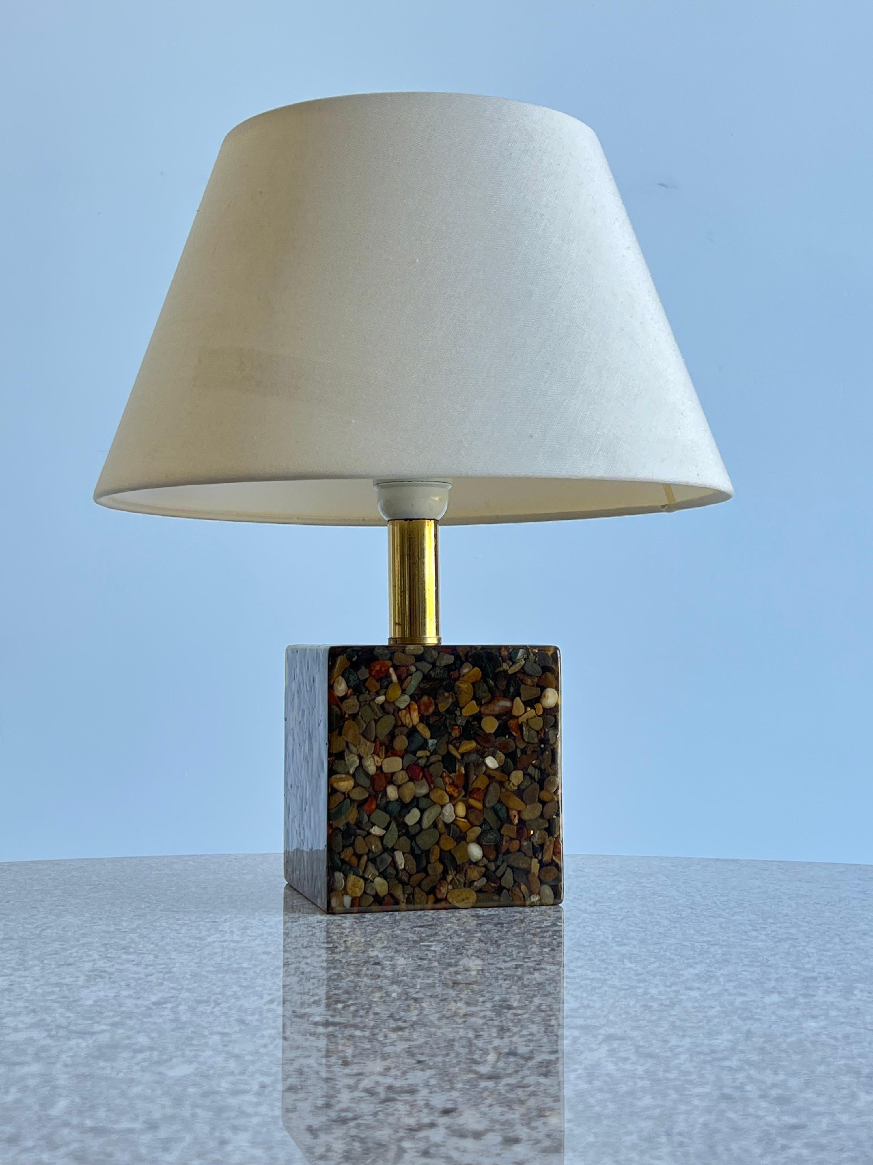 Set of two bed side lamps in epoxy resin with stones and brass by Arte Luce 1970s.
Very beautiful lamps by Arte Luce perfect for a bad side lamps.
Perfect working condition original shades.
 