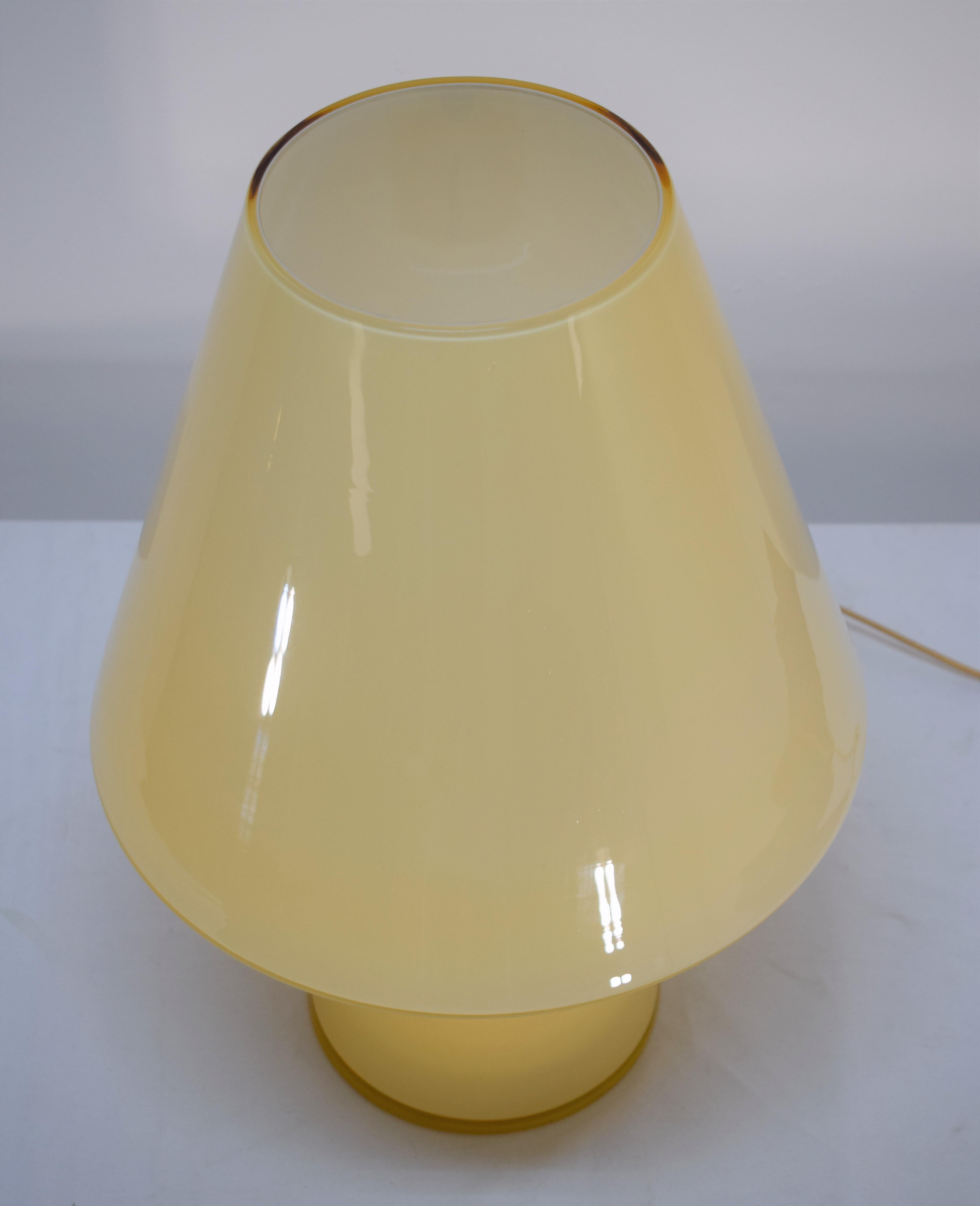 Italian table lamp by Vistosi, Murano, 1960s.

Dimensions: H= 50 cm; D= 36 cm.