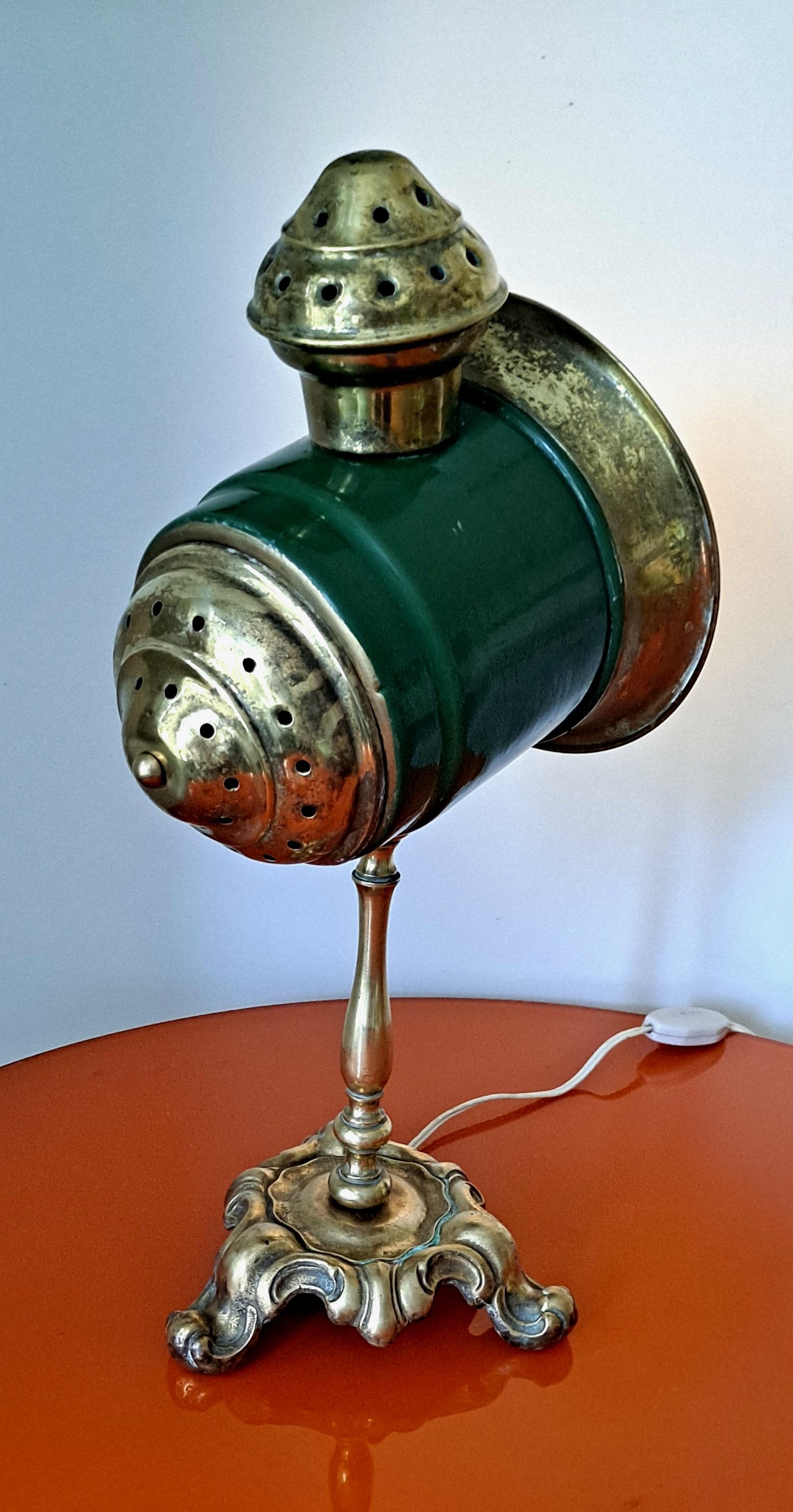 Antique Italian table lamp used in the 1900 s like the carriage spot light working on the petroleum .Lamp have the Murano glass behind the bulb to produce enormous spot light  for the traveling .
 I recommend bulbs no more than 25 watts or floor