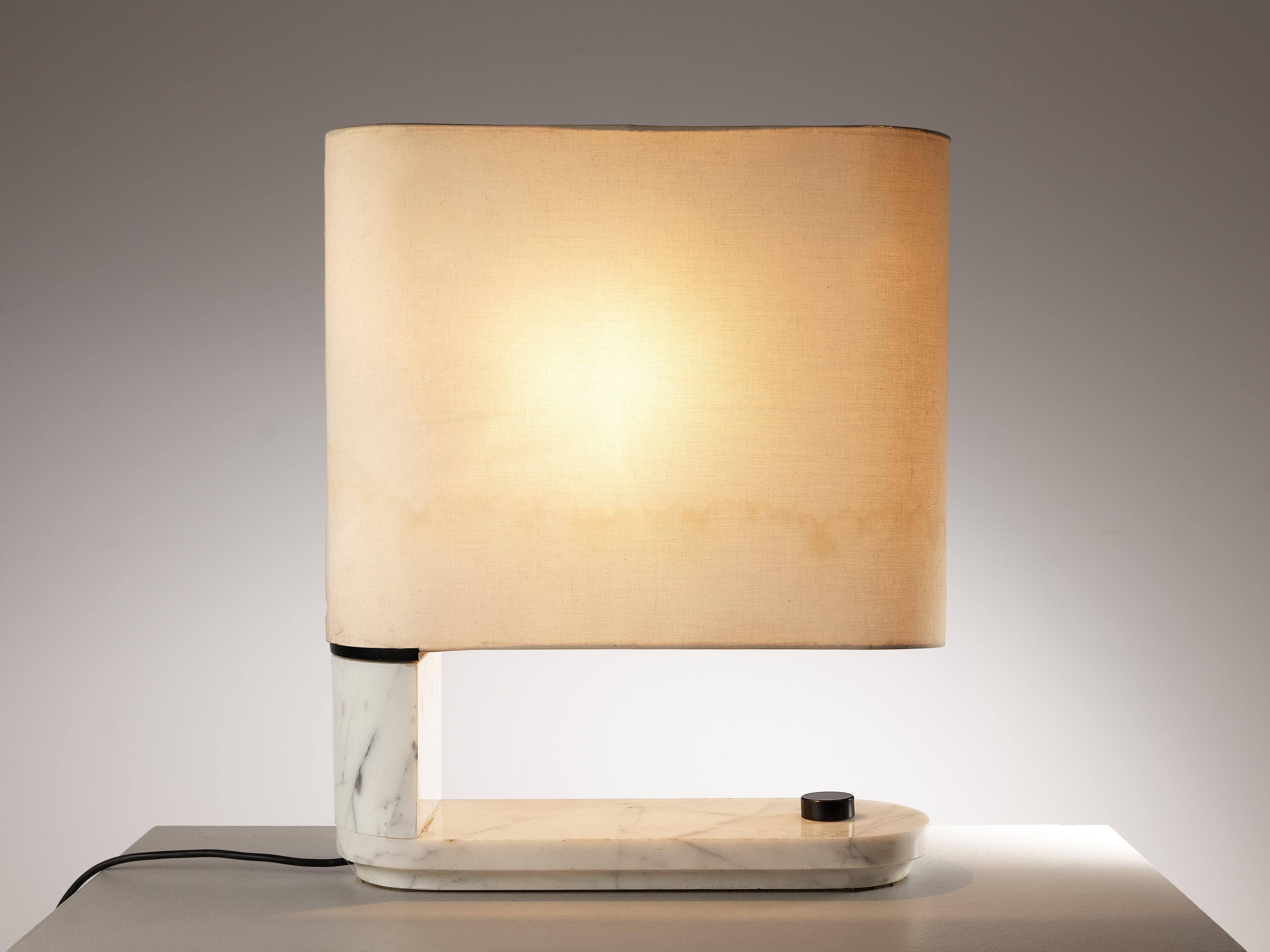 Stilnovo, table lamp, Carrara marble, canvas, Italy, 1970s

A postmodern lighting object created by the Italian lighting company Stilnovo. A quite unconventional shape based on a rectangular shape with round corners discernible in the base and the