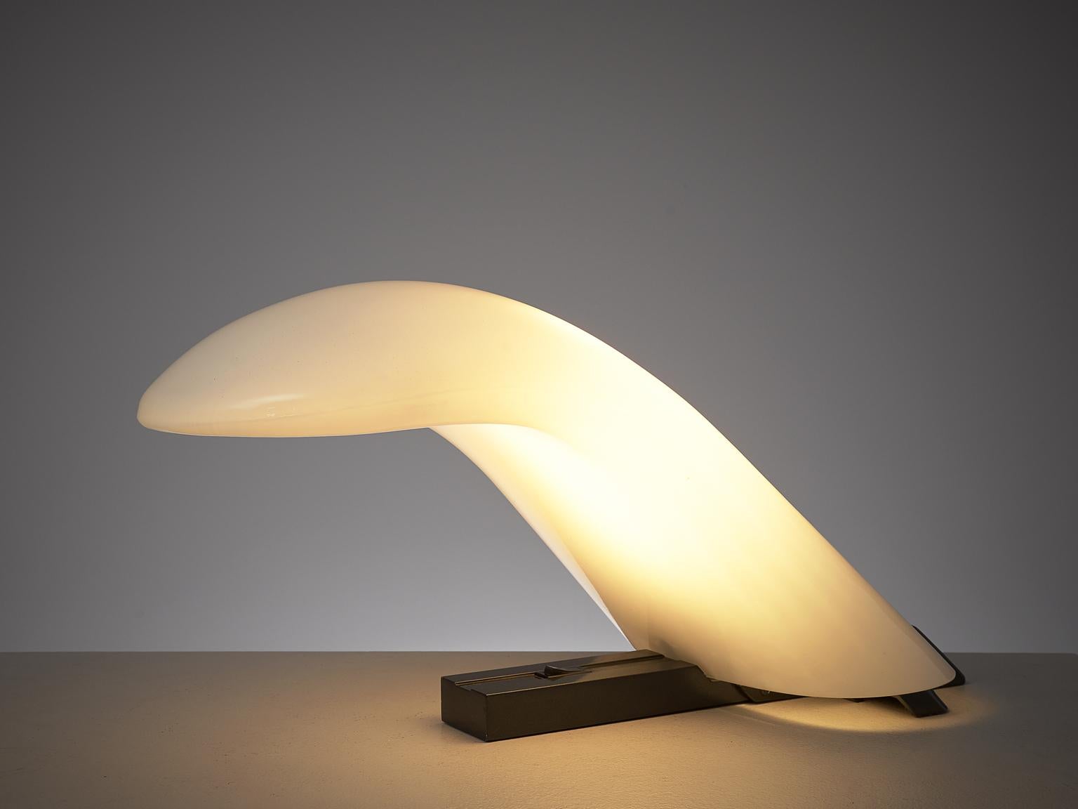 Table lamp, opaline glass and steel, Italy, 1960s

A wonderful desk light with an expressive appearance. The shade is made of thick, opaline glass, which rests on a lacquered steel base. The light shines directly on the table, but creates also