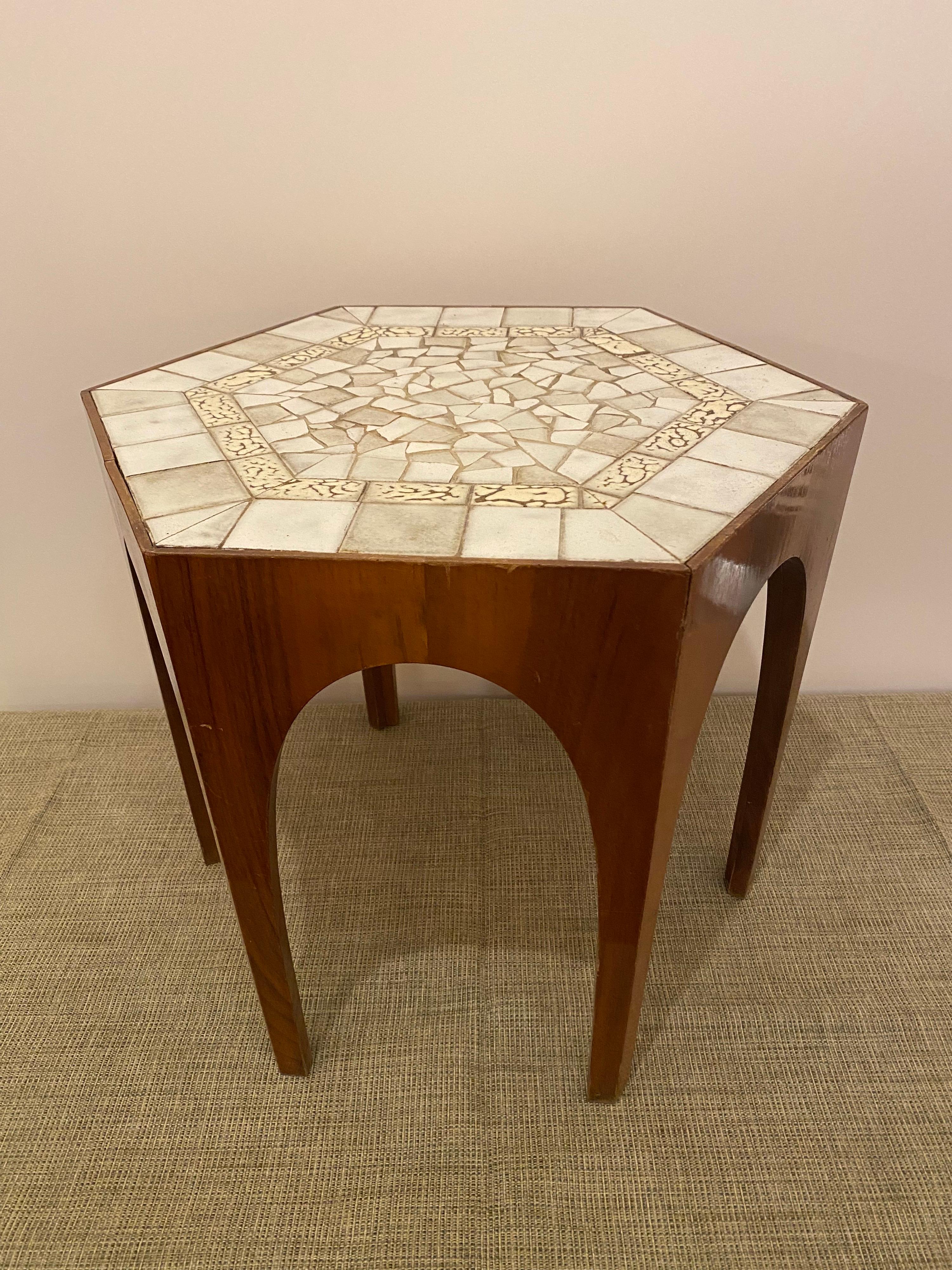 Italian mahogany hexagonal tile top table. Retains Italian label to underside. Perfect size for multiple uses! Has a feel like some of the Harvey probber designs as well.