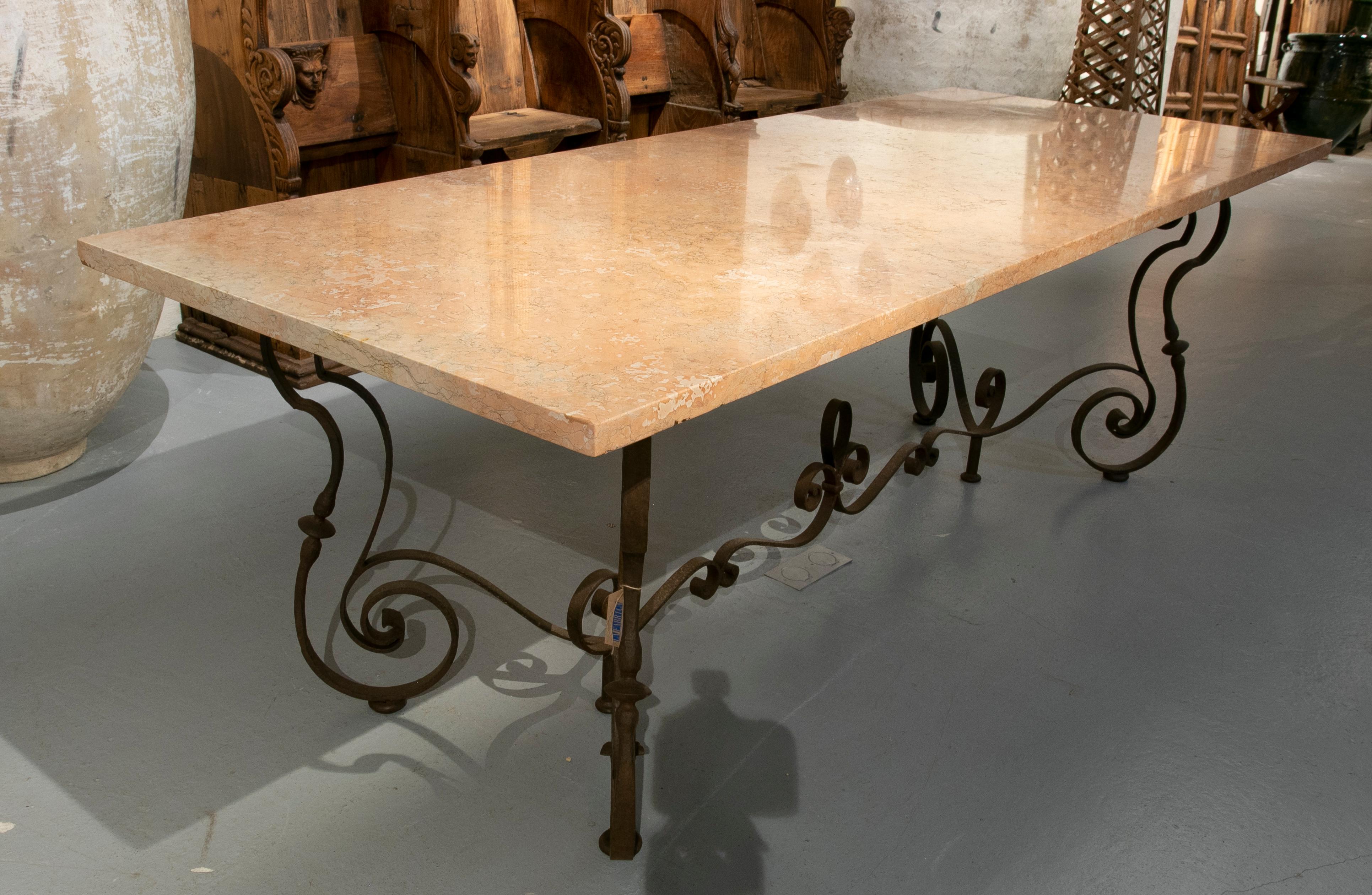Italian table with iron base and rosseta marble top from verona.