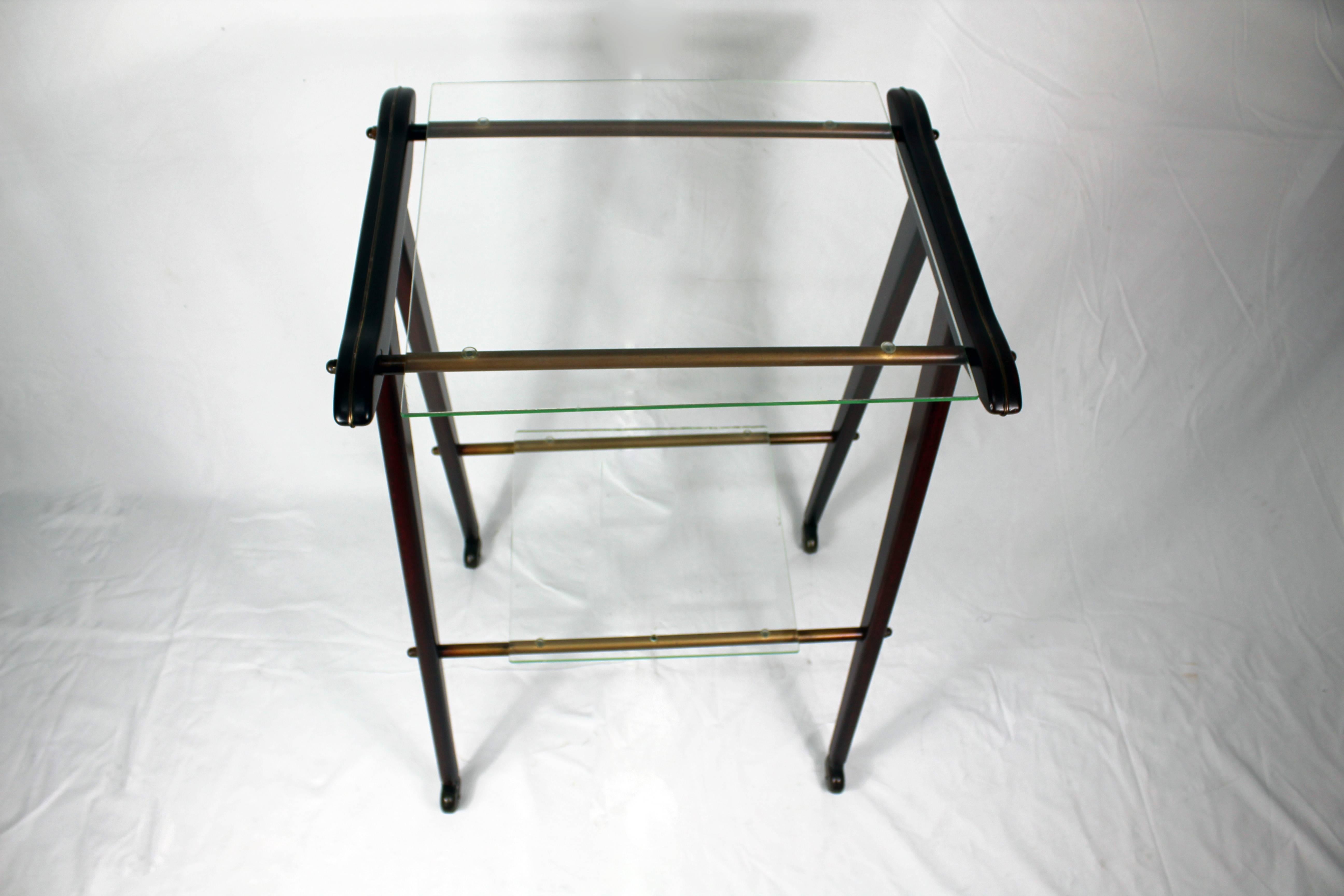 Television table made of wood with two removable glass racks. 
Made in Italy, circa 1950.
Restored.