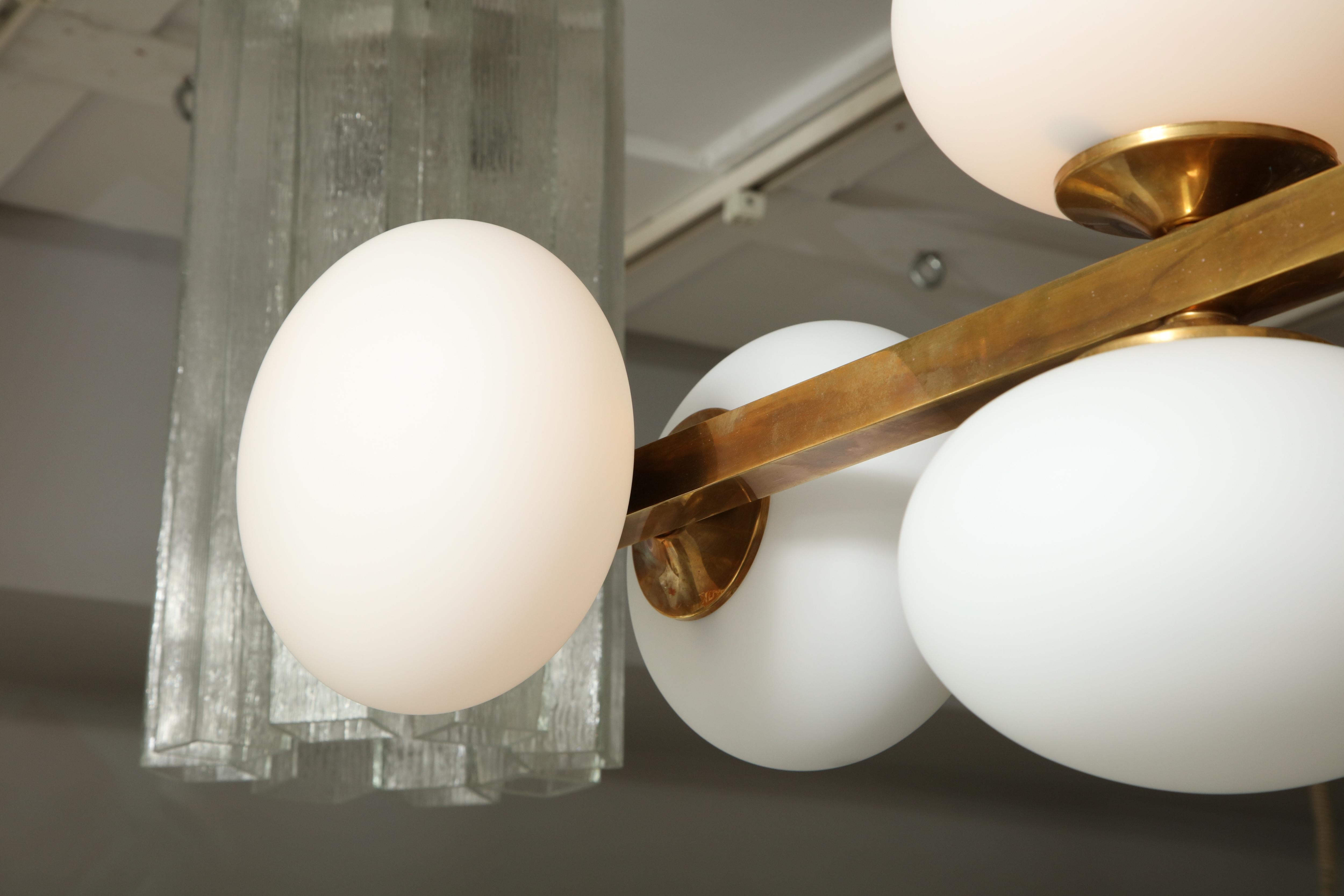 Ten Elongated Opaline Glass Globe Chandelier In New Condition For Sale In New York, NY