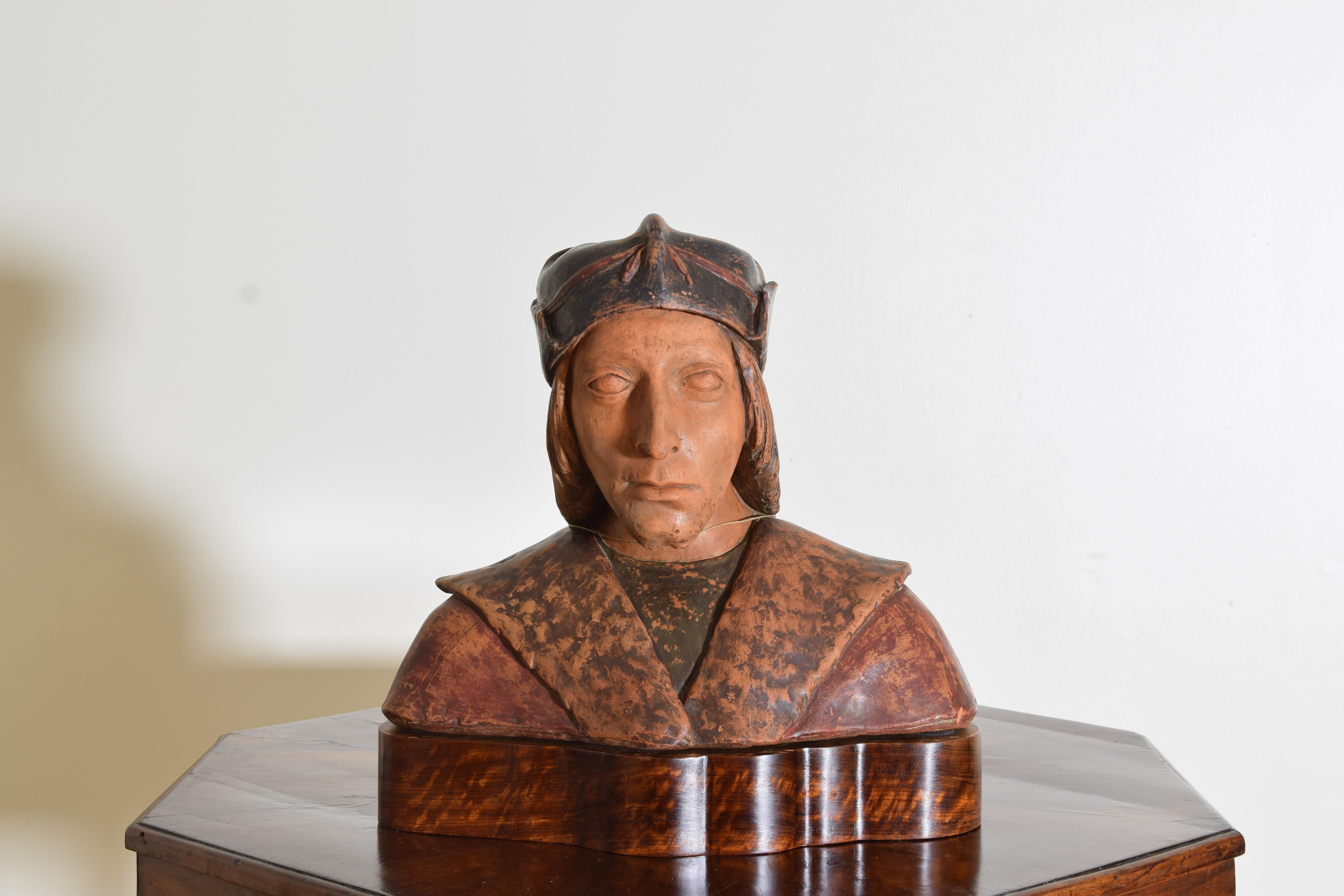Made for the export market, likely late Grand Tour, of painted terra cotta, depicting Dante Alighieri, raised on a fitted exotic wood plinth, retaining its leaded export tag from the Venetian Republic