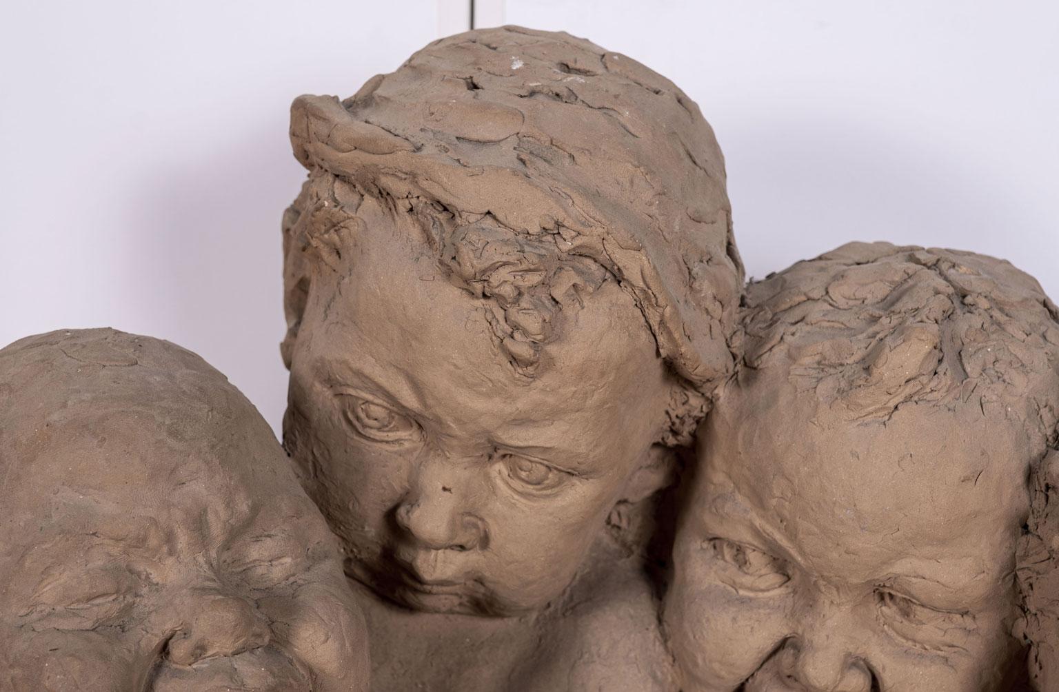 crying baby sculpture