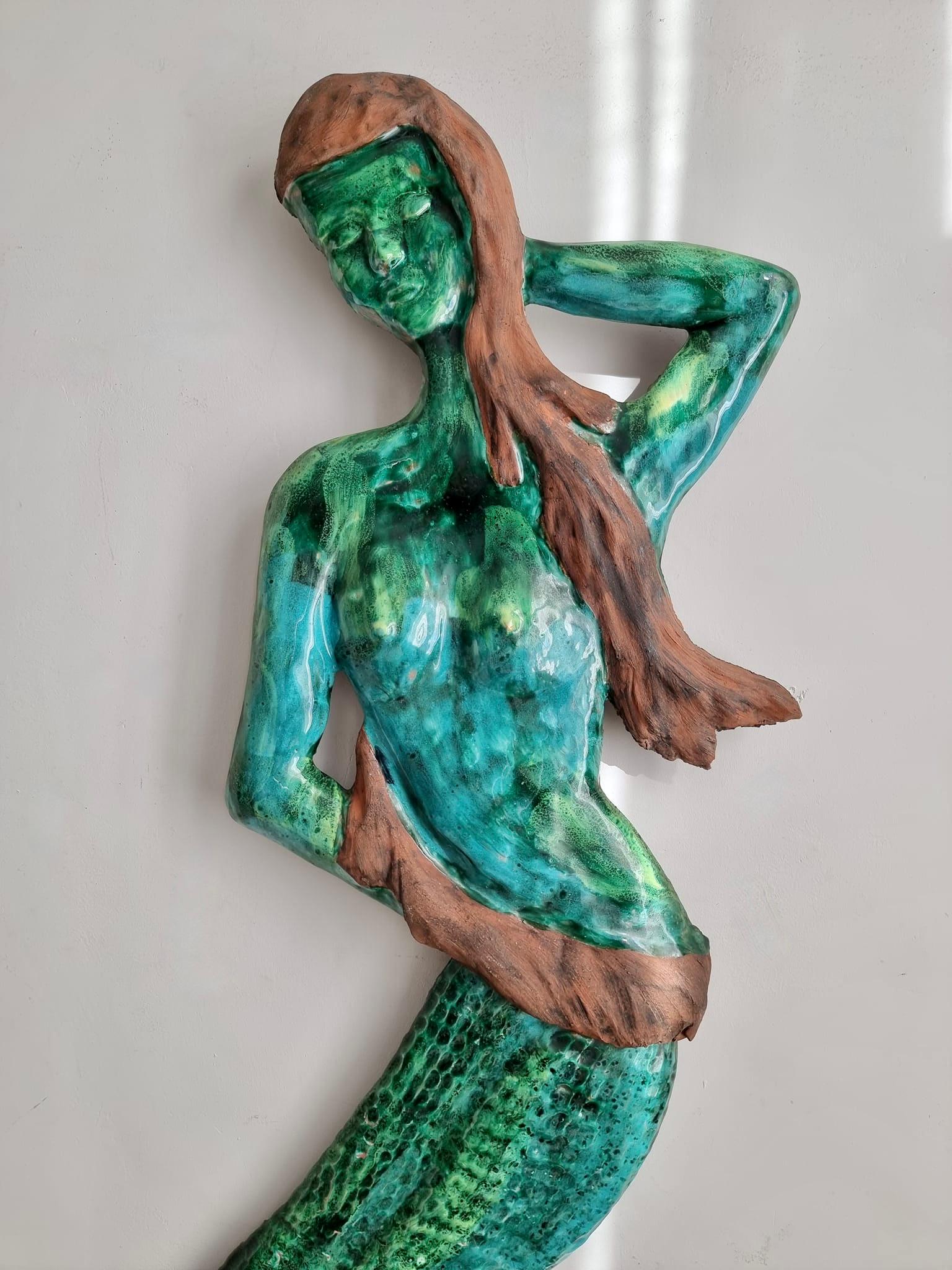 Beautiful large Italian (1970s)  ceramic wall plaque of a mermaid figure.

Height 44.8