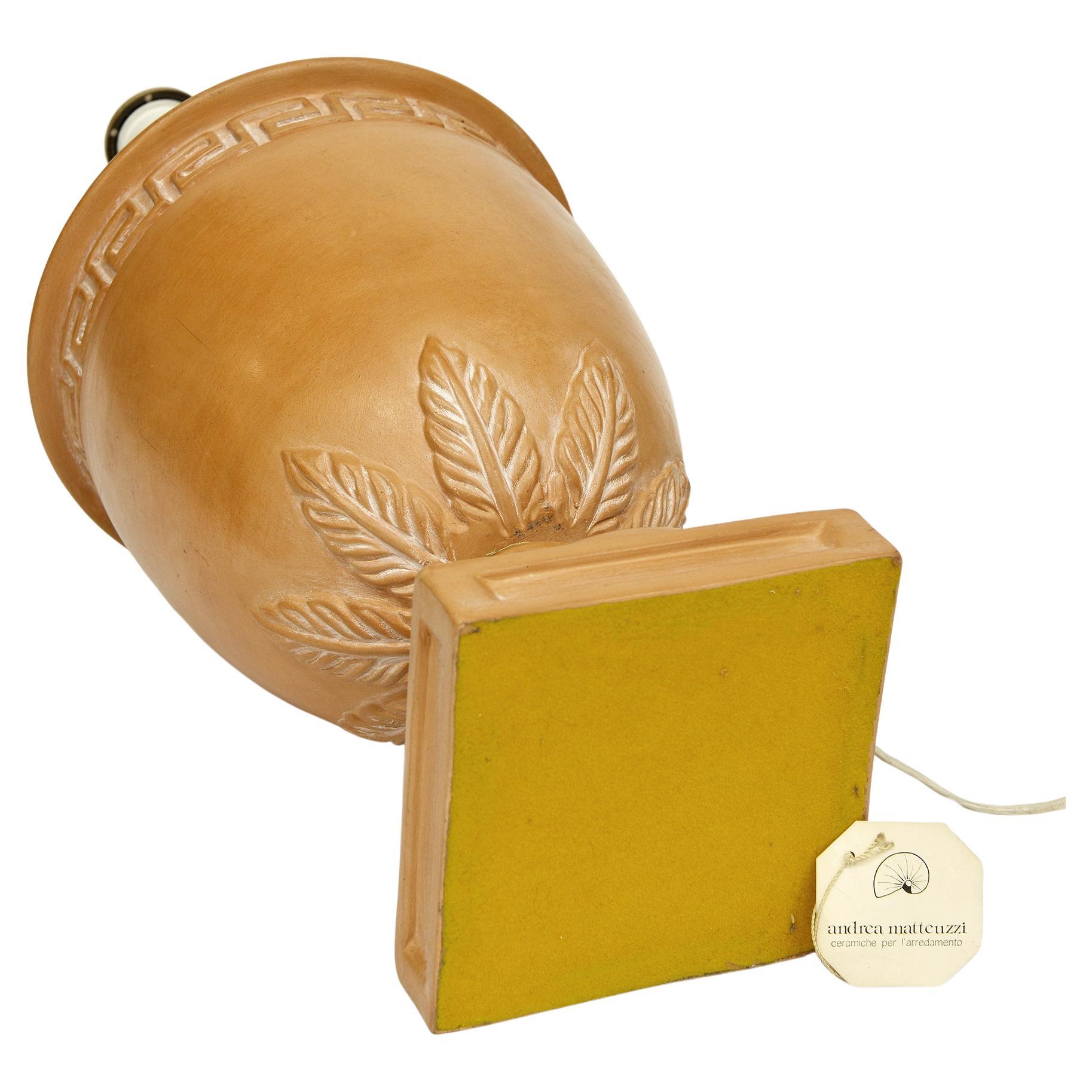 Italian terracotta table lamp, elegant in its essential simplicity.
It can be shipped anywhere from Italy, without the pulk of the hat which You can do as You want.

ref. nr. 2050 -