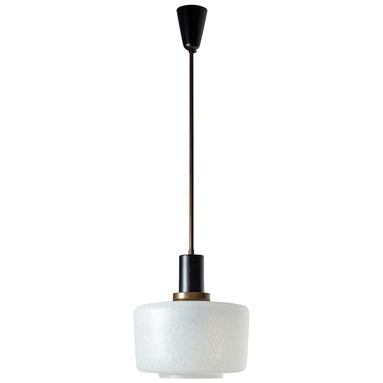 Fine Italian pendant from the late 1950s-early 1960s. Very unusual diffuser made of thick clear glass with a satin finish on the outside as well as contrasting clear glass texture resembling coalescing water drops. The hardware is dark patinated