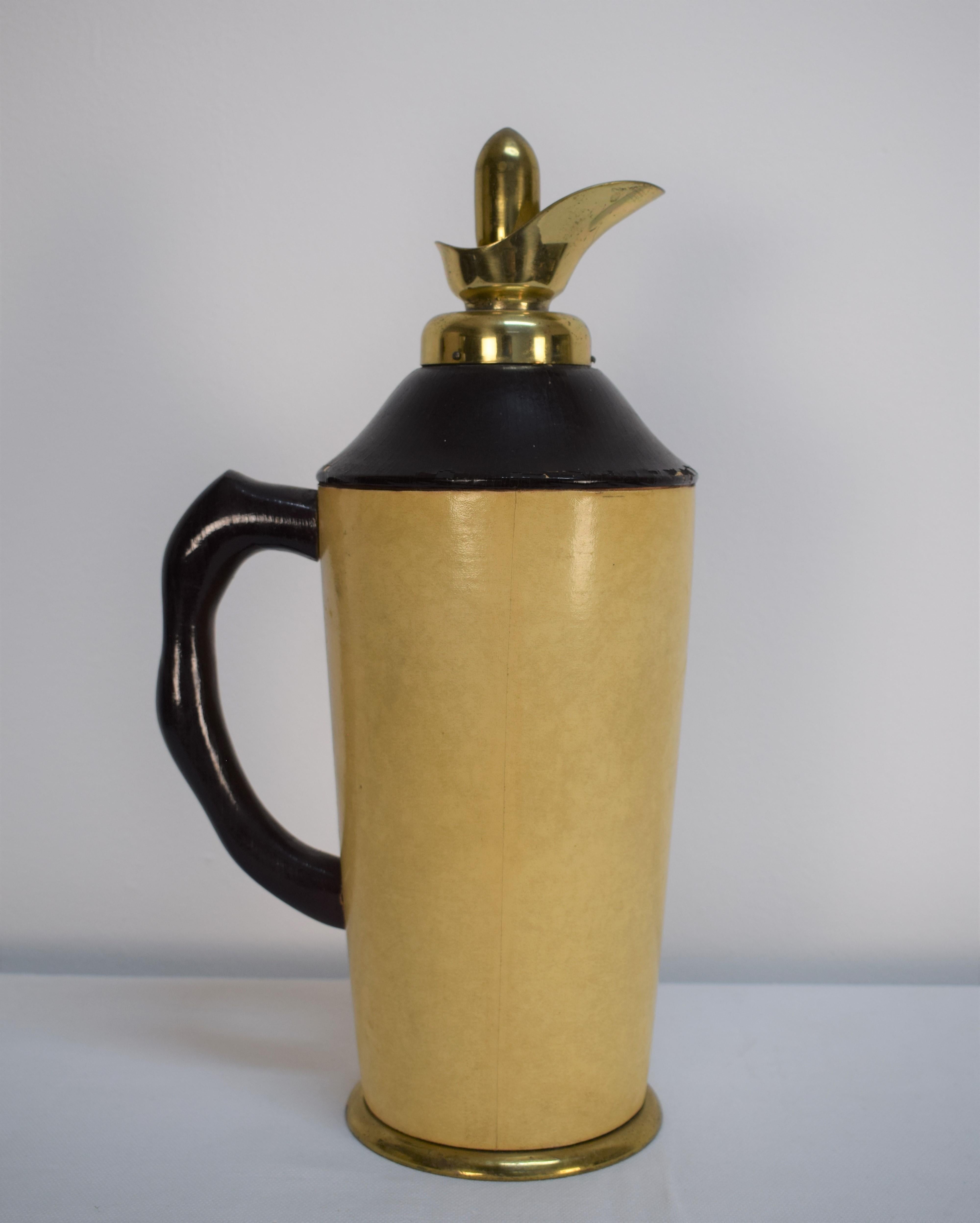 Italian thermos by Aldo Tura for Macabo, 1960s.

Dimensions: H= 35 cm; W= 18 cm; D= 10cm.