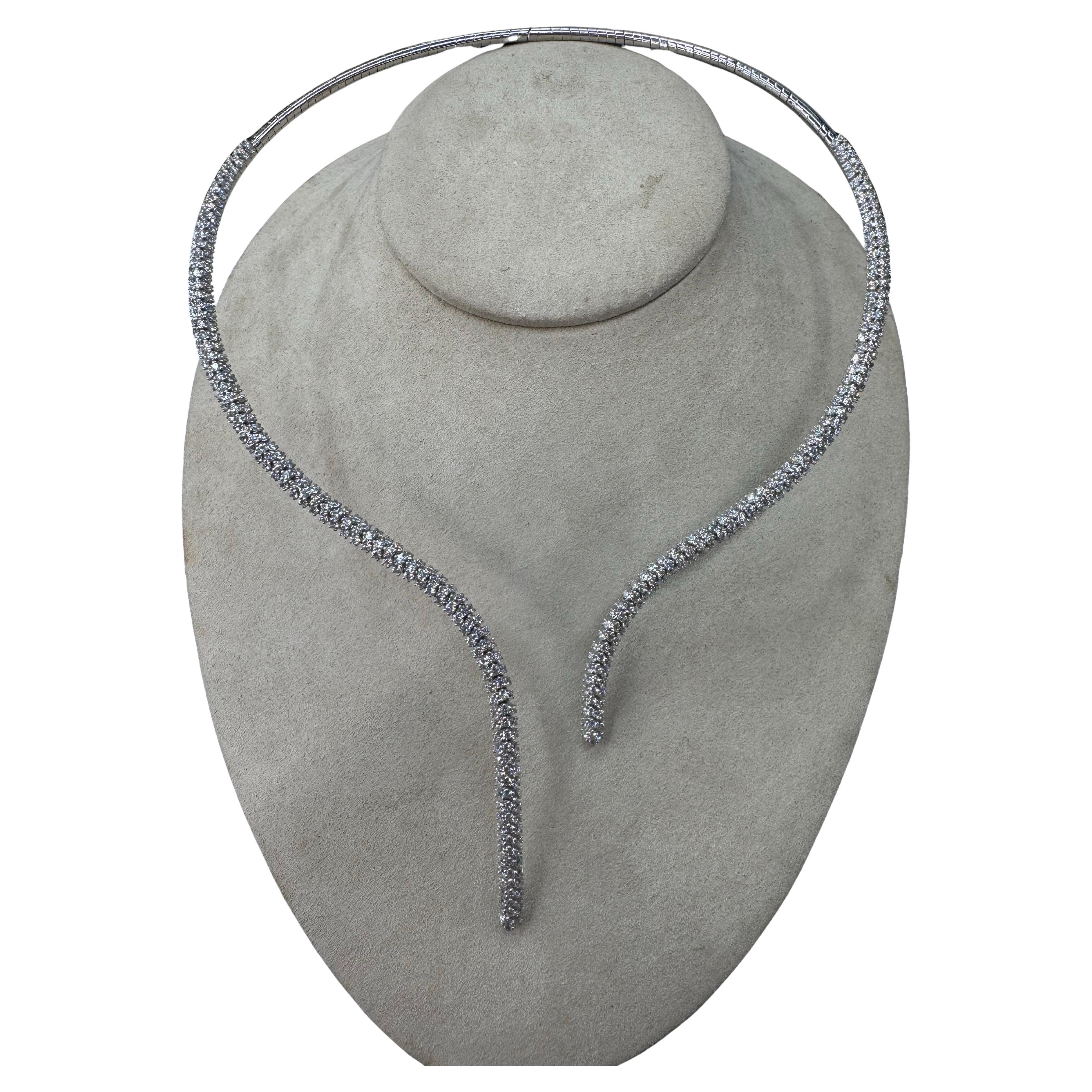 Italian, 18 karat white gold flexible necklace featuring a three row split drop containing 437 round brilliants weighing 9.68 carats. 
Color F-G
Clarity VS2

Super Chic & Fashionable - A Real Stopper!!!!