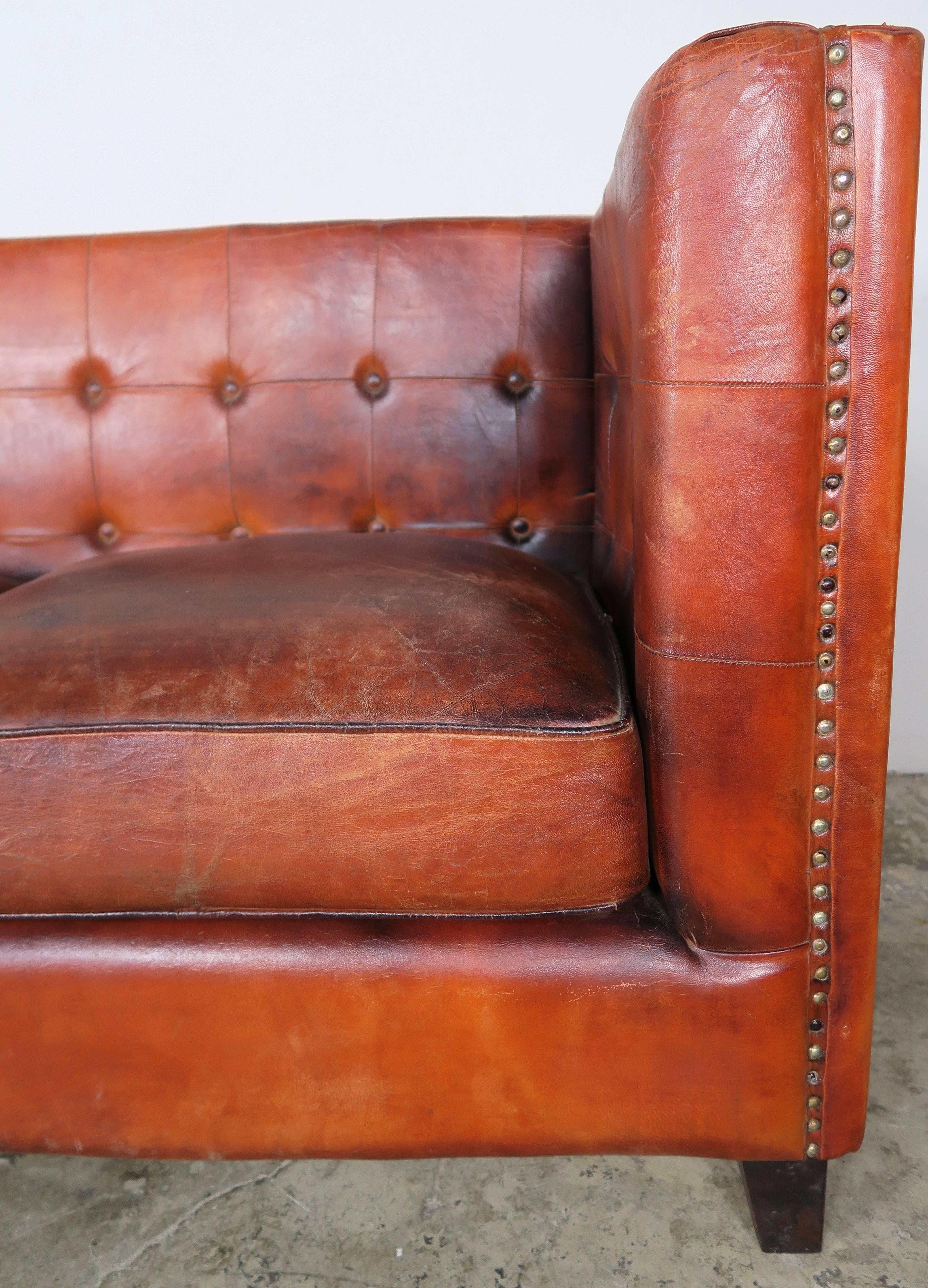 tobacco colored leather couch