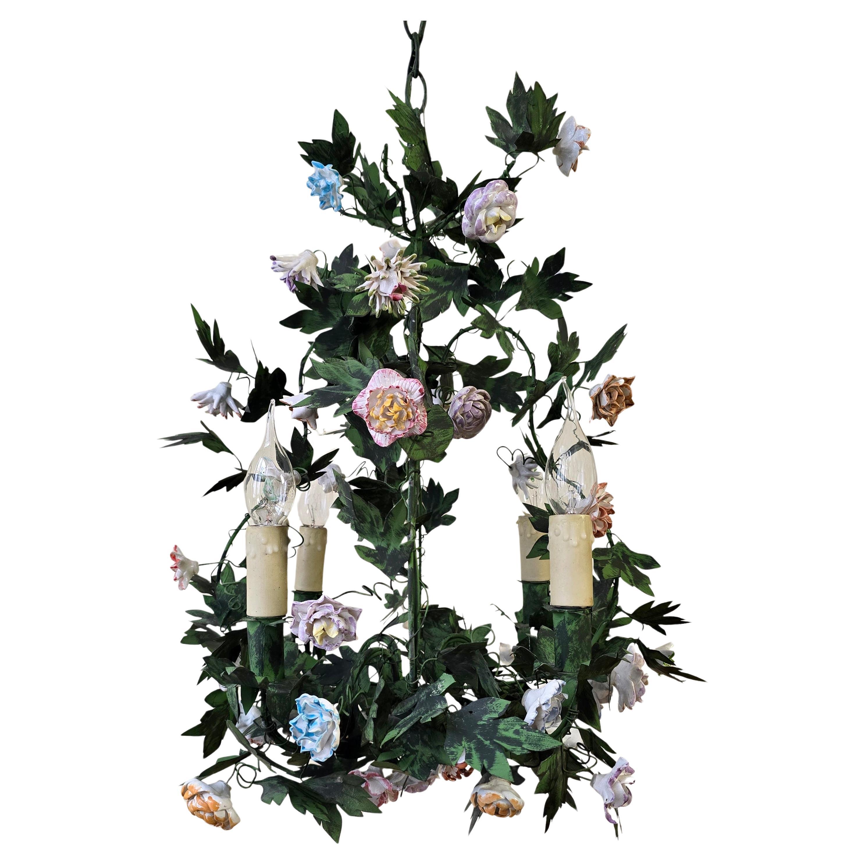 Romantic Italian tole chandelier with hand-painted porcelain flowers in delicate pastel tones. A poetic floral design from the 1950s, crafted in the style of Capodimonte ceramics.

An enchanting Italian chandelier from the 1950s, combining a