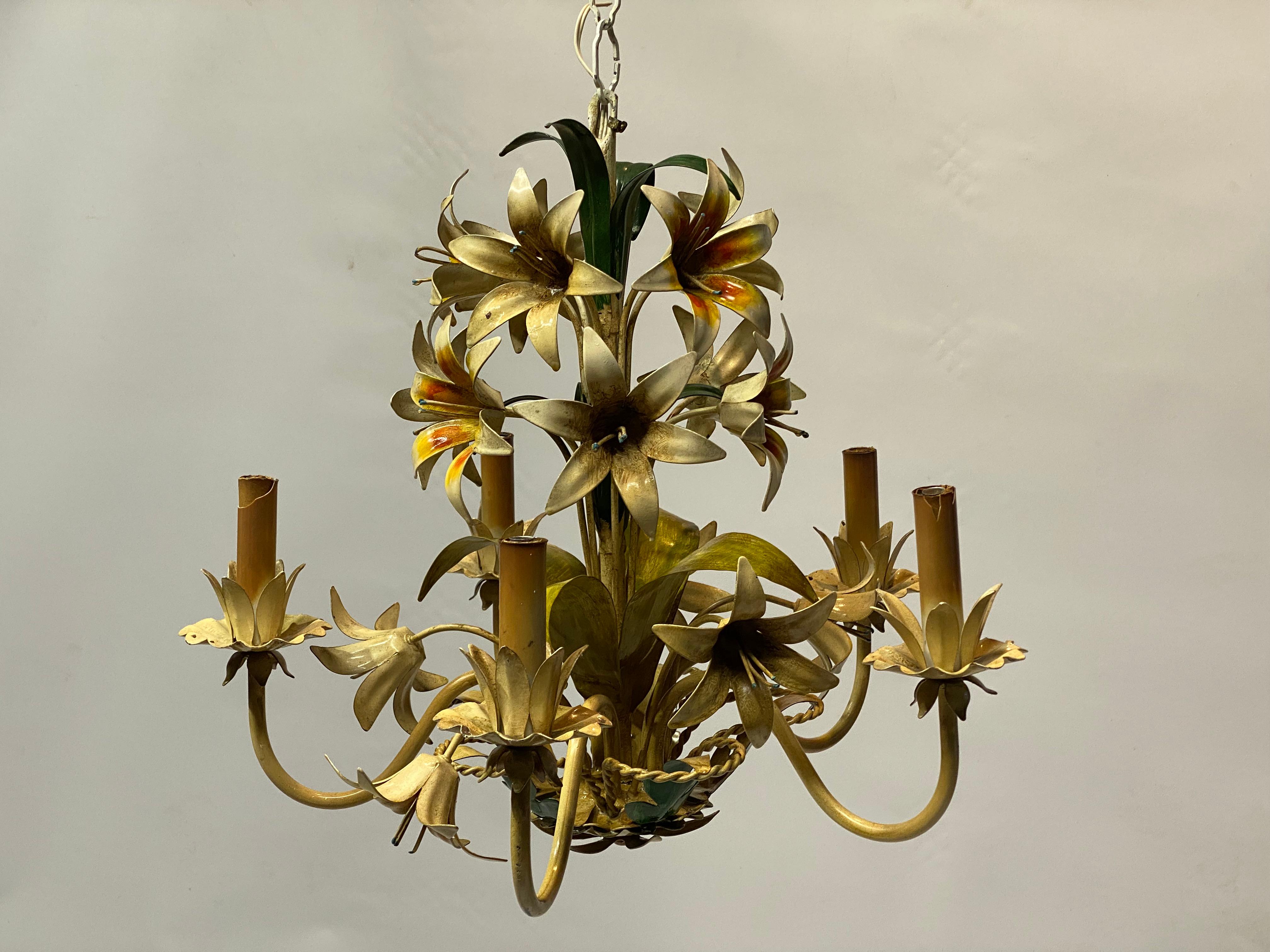 Nothing beats the pure fun decorative quality of these realistically painted floral tole lighting fixtures from Italy. Circa 1960-70. Five light chandelier. Each light can handle a 10-20 watt bulb. 

Good overall condition with some minor enamel
