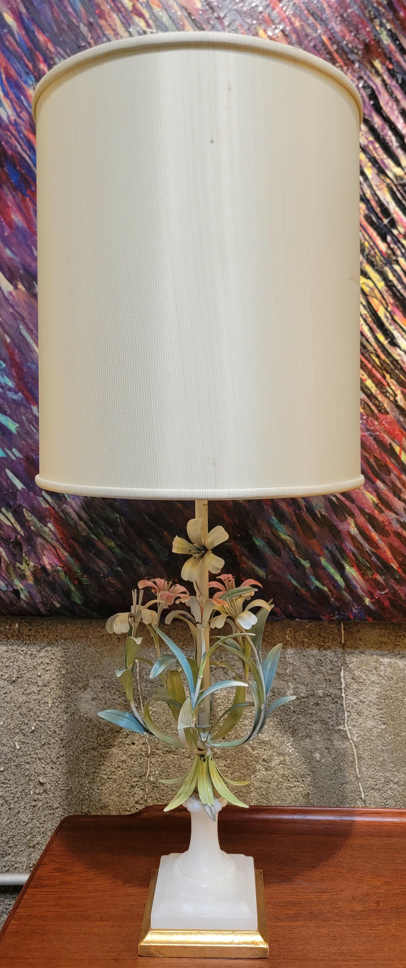 Safran & Gluckman Import Italian tole painted floral and alabaster table lamp. Base measures 5.38 inches square. Metal floral measures 8.5 inches diameter.