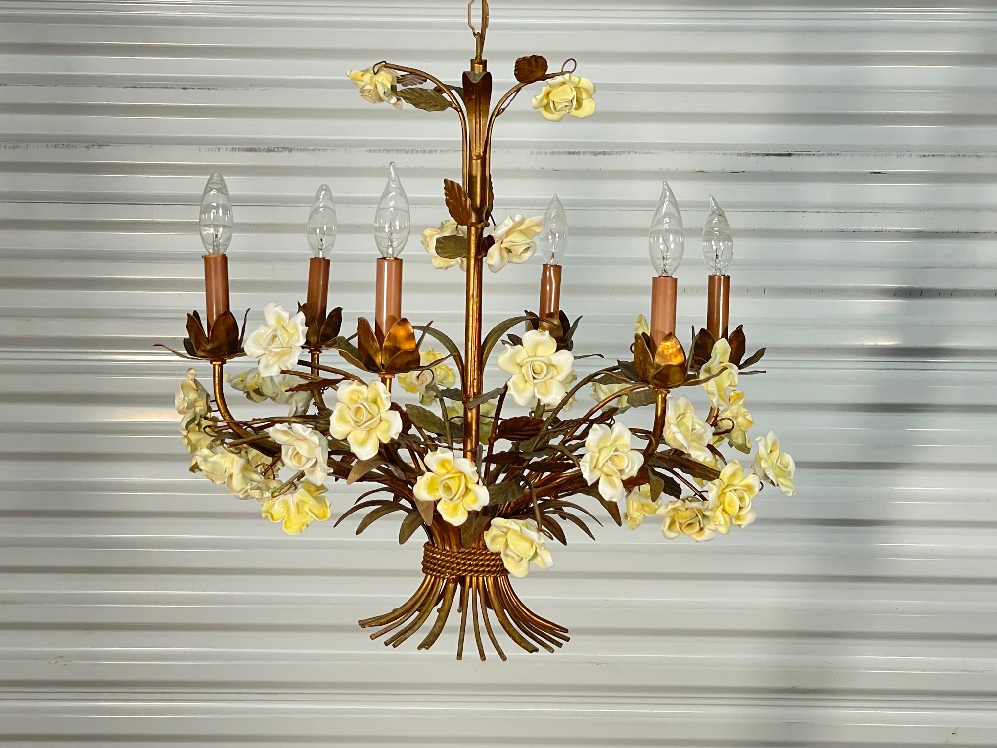 Tole metal chandelier features ceramic roses and original 