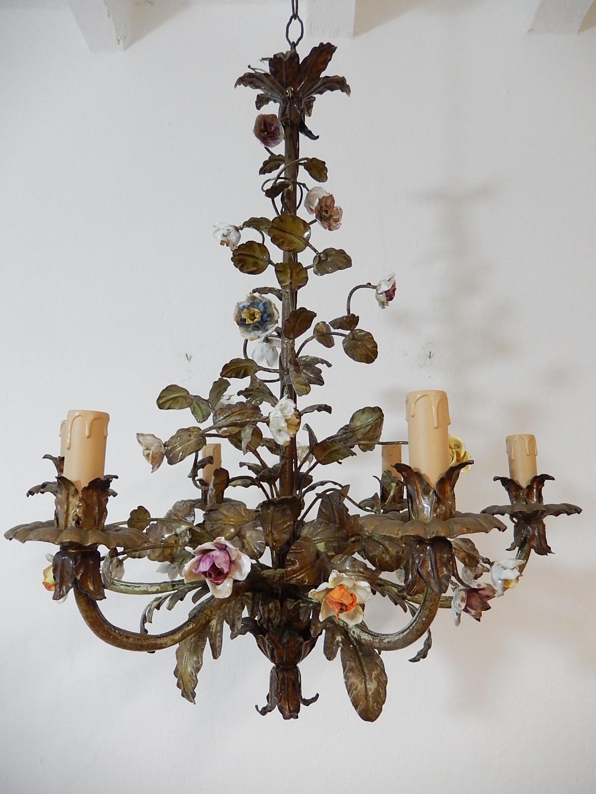Housing 6 lights, will be rewired with appropriate sockets to country and ready to hang. Original spotty color tole leaves. Gorgeous handmade roses and flowers! All intact. Gold gilded accents. Adding 12” of original chain. Free priority shipping