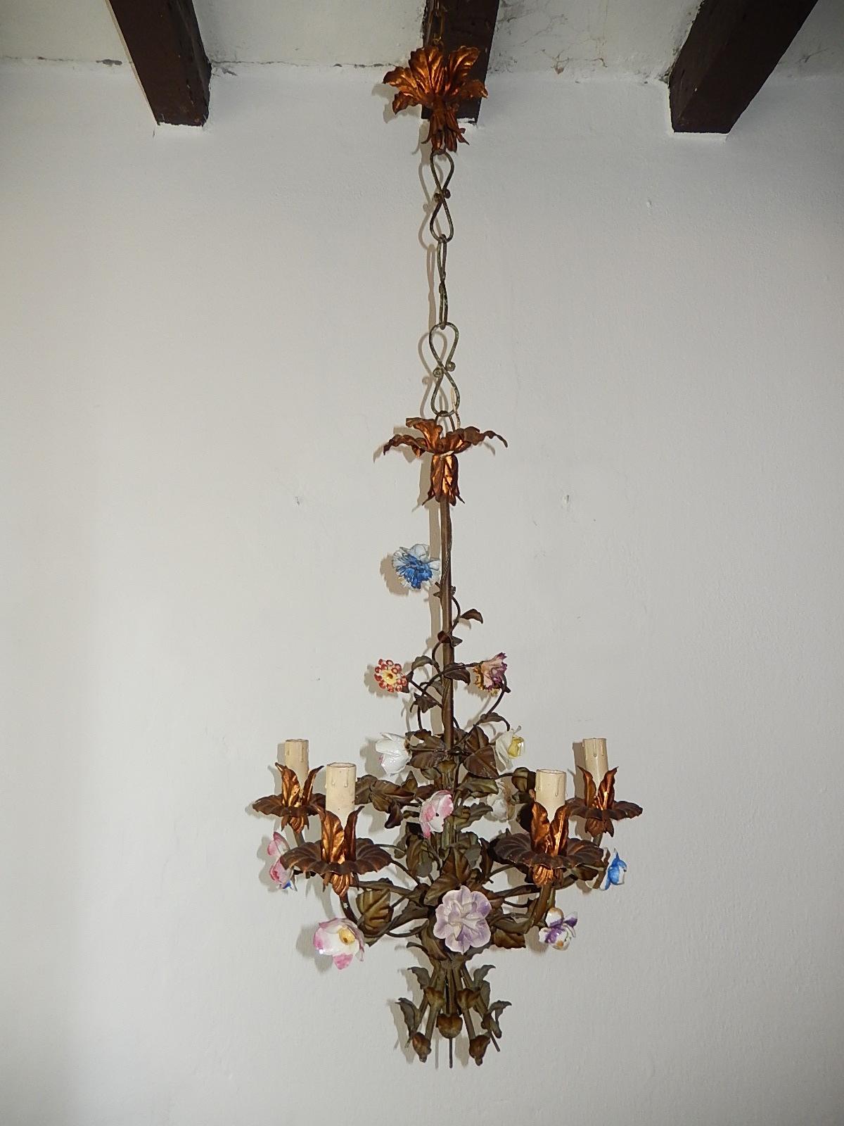 Housing five lights. Original color tole with gold bulb holders, top and canopy. Handmade porcelain flowers, only a few chips. Adding 17 inches of original chain and canopy. Re-wired and ready to hang! Free priority UPS shipping from Italy.