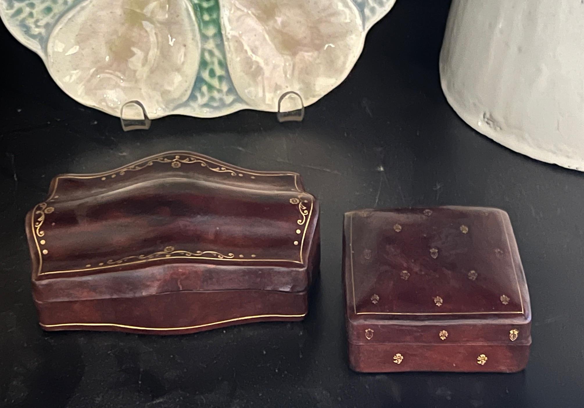 Set of two Italian tooled leather boxes with gold embossing on each, made around the 1960's.  Made in letter is embossed on the larger box.

Rectangle box: 5.1