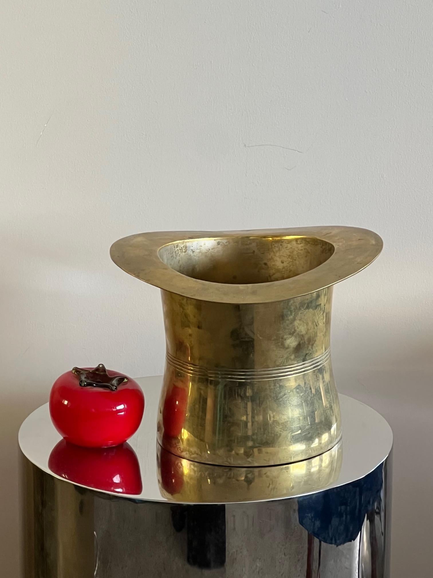 Unusual and fun, heavy brass, ice bucket shaped like a top hat.