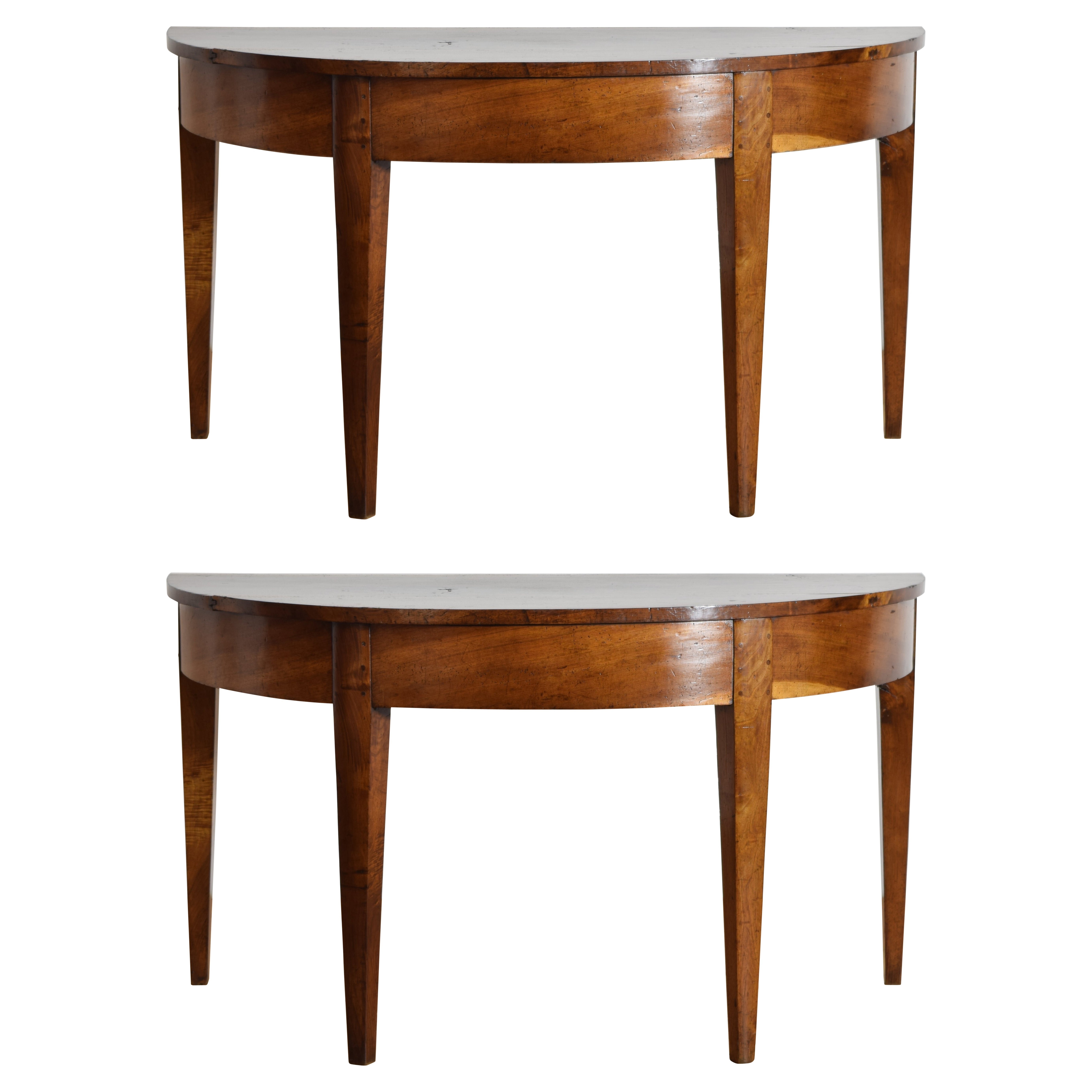 What is a demilune table?