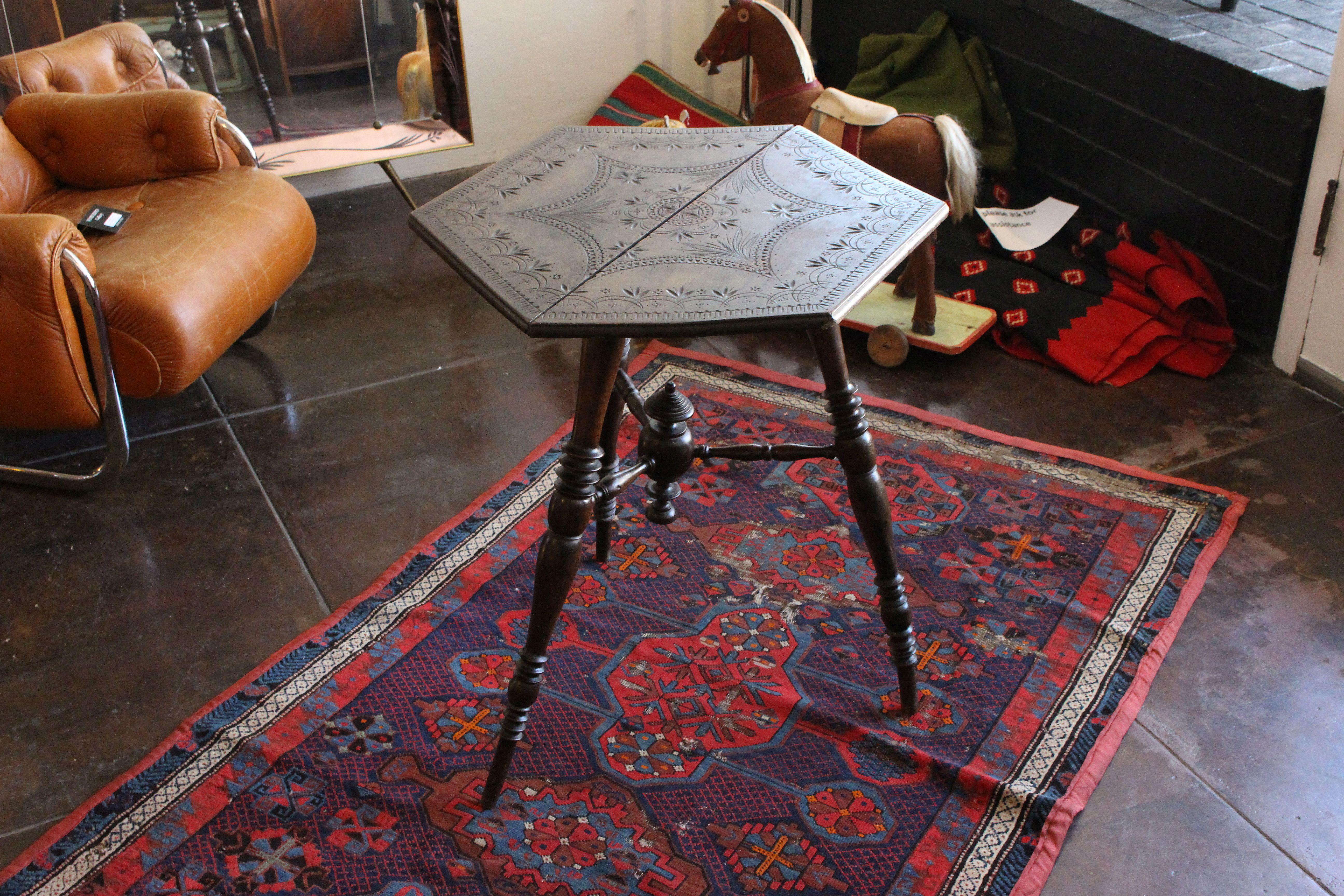 Hand carved game table. Table is in style of tramp art, origin South of Italy, circa 1900s.
Shipping US continental  in home delivery $400