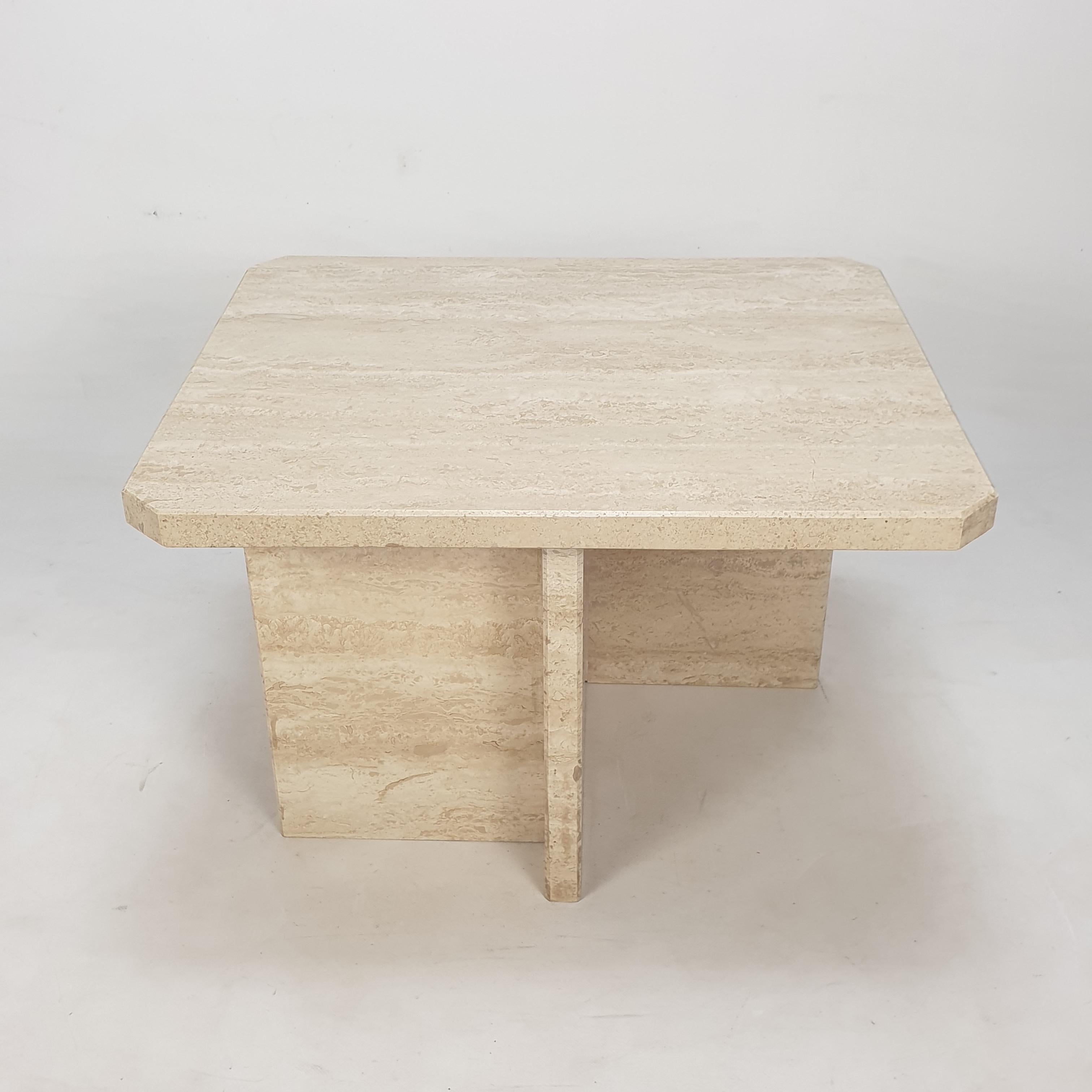 Very nice Italian coffee table from the 80's, handcrafted out of travertine. 

It has a thick and solid rectangle top. 

The plate and the base are made of very nice travertine.