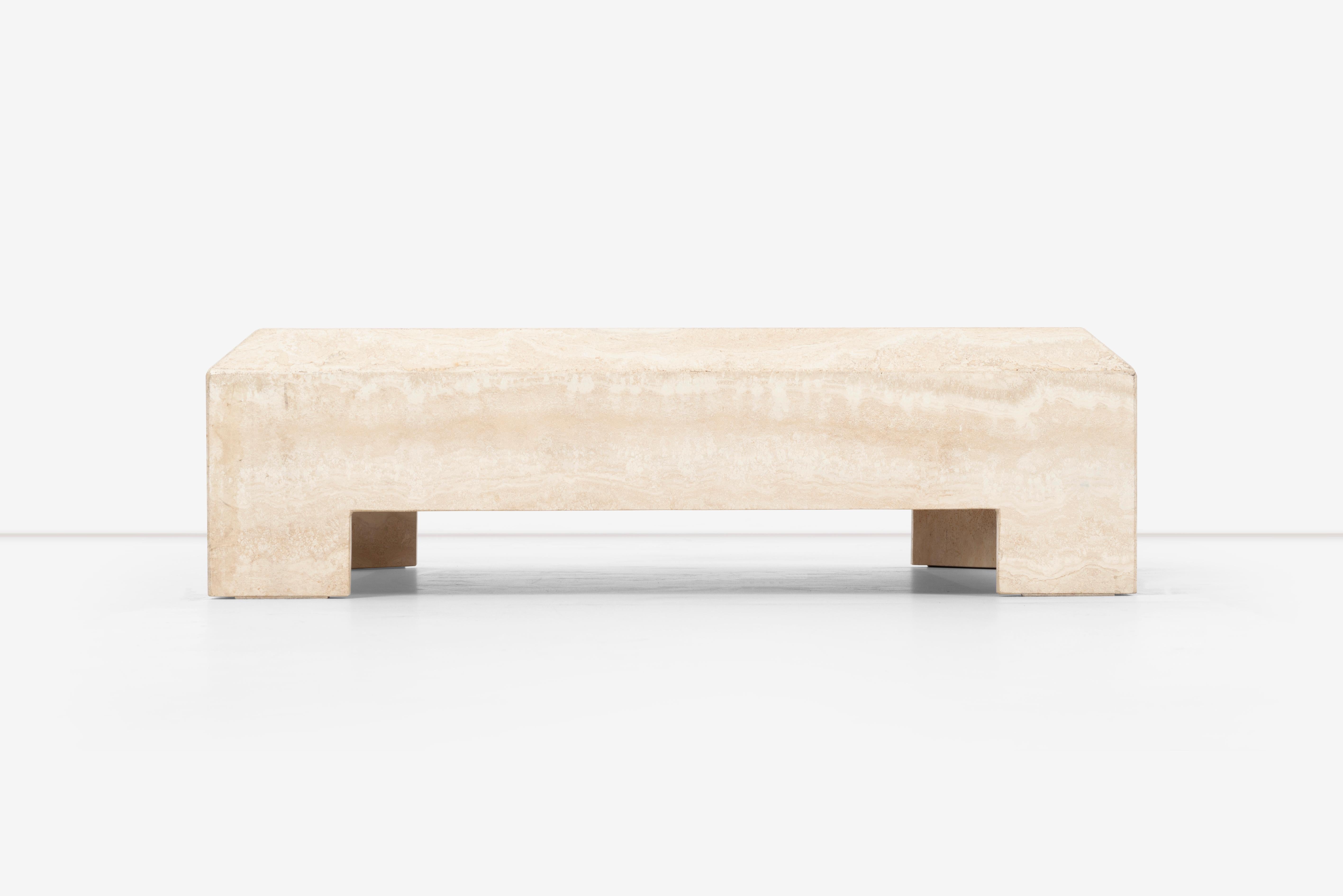 Solid Italian travertine coffee table with large beveled edge.
