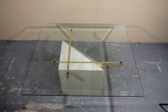Italian travertine coffee table with brass supports and glass top