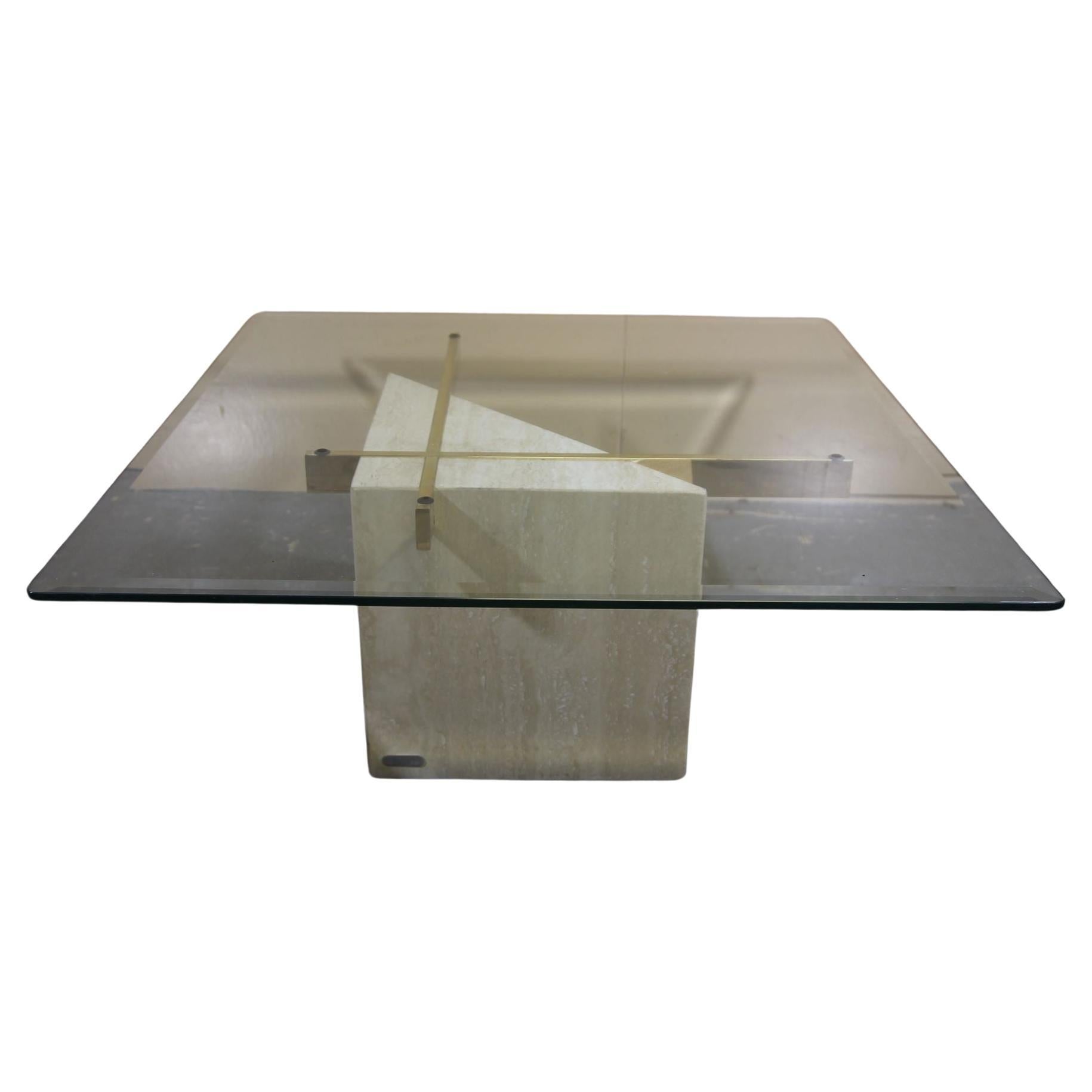 Italian travertine coffee table with brass supports and glass top For Sale