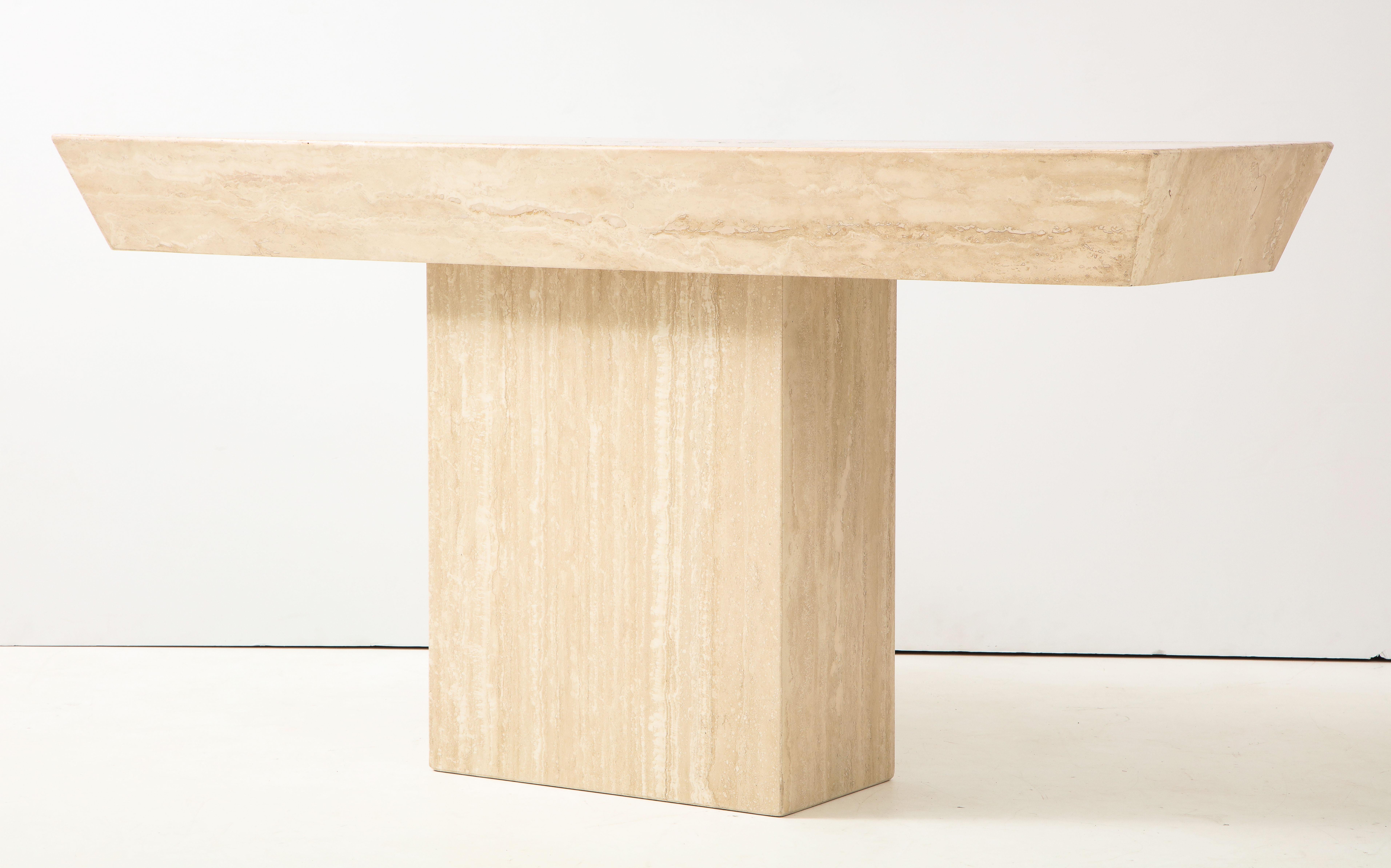 Beautiful 1980s Italian polished travertine console.
The simple rectangle base supports the top which has a trapezoid shaped
edge to create a minimalist console.